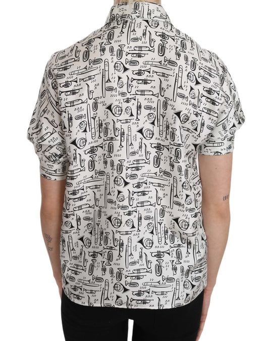 Short sleeve shirt with black and white pattern featuring various objects