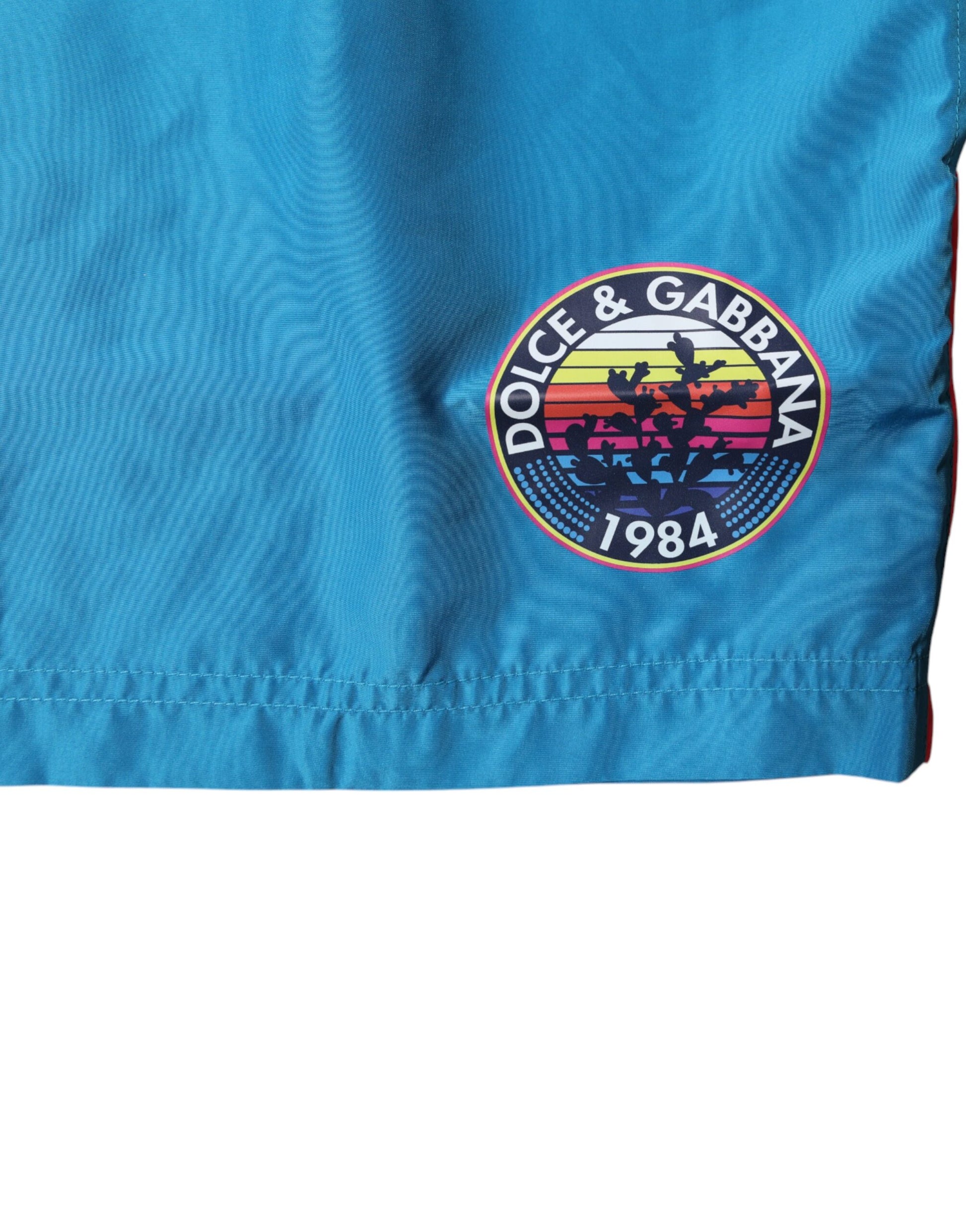 Blue beachwear shorts with logo on front