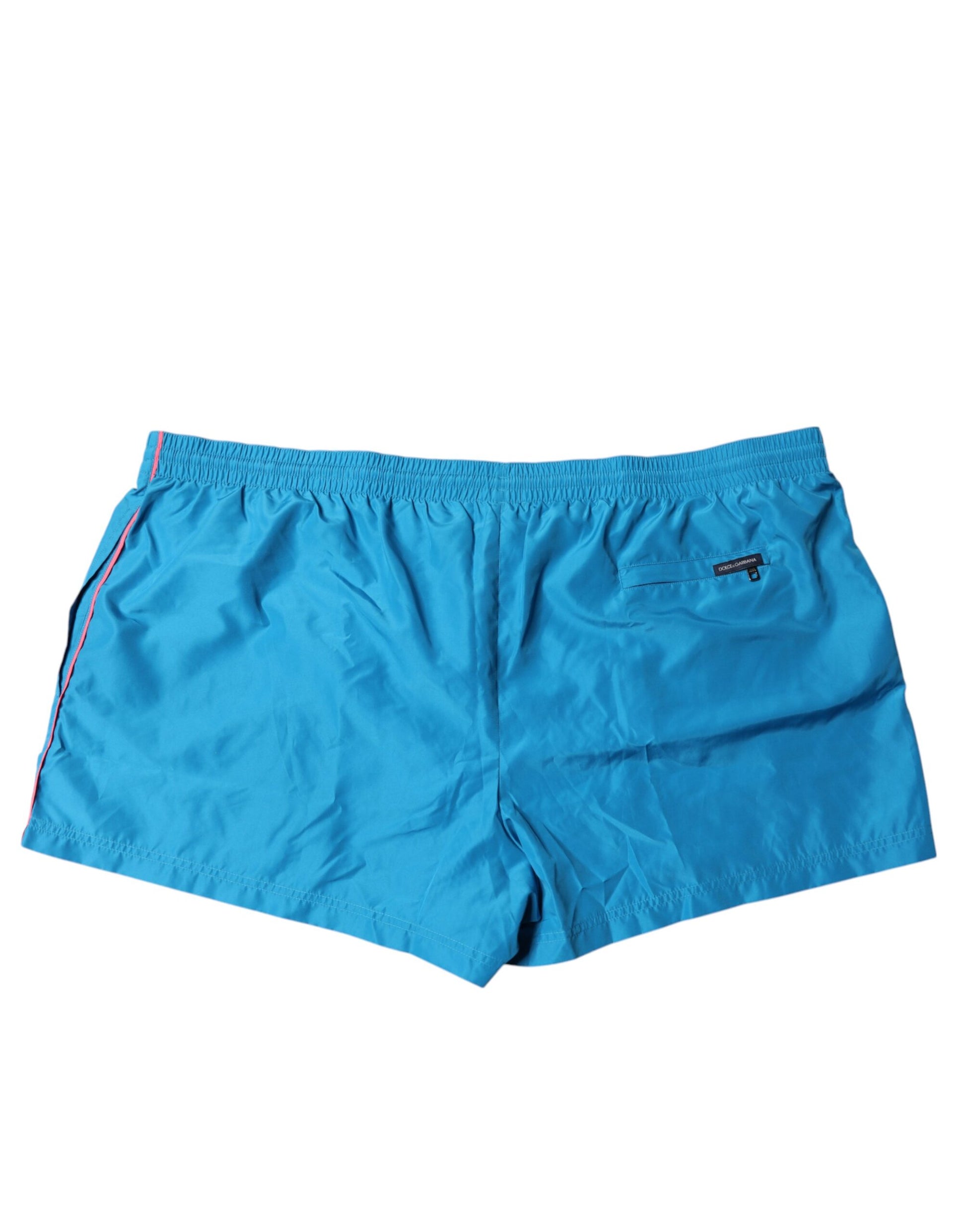 Blue swim shorts with logo on left leg