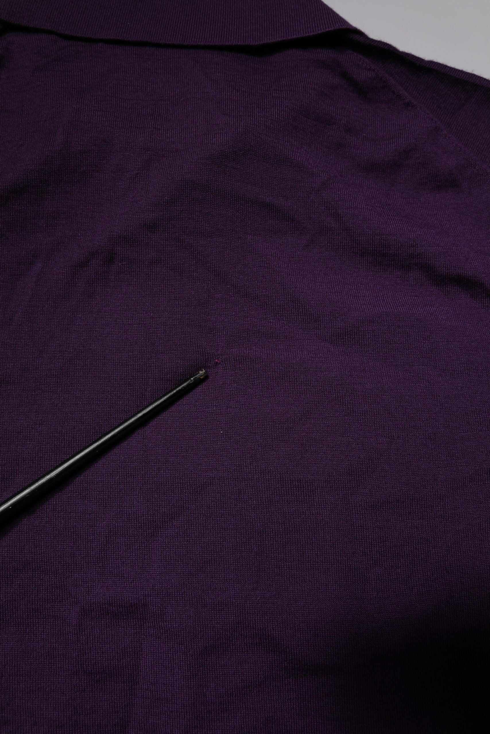 Purple knitted sweater with black zipper