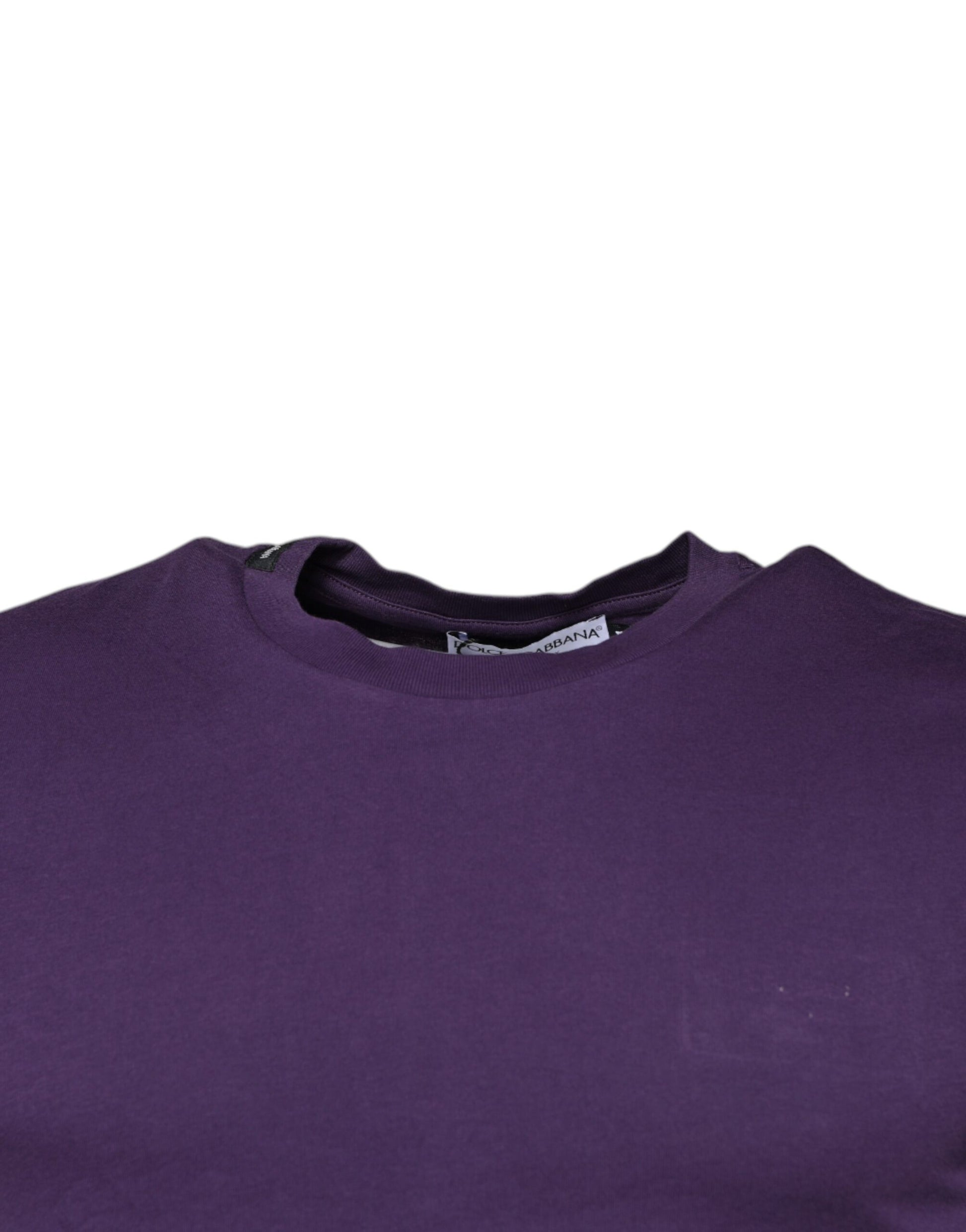 Purple crew neck t-shirt on hanger