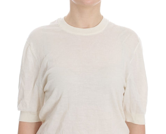 Tan short sleeve t-shirt on a person