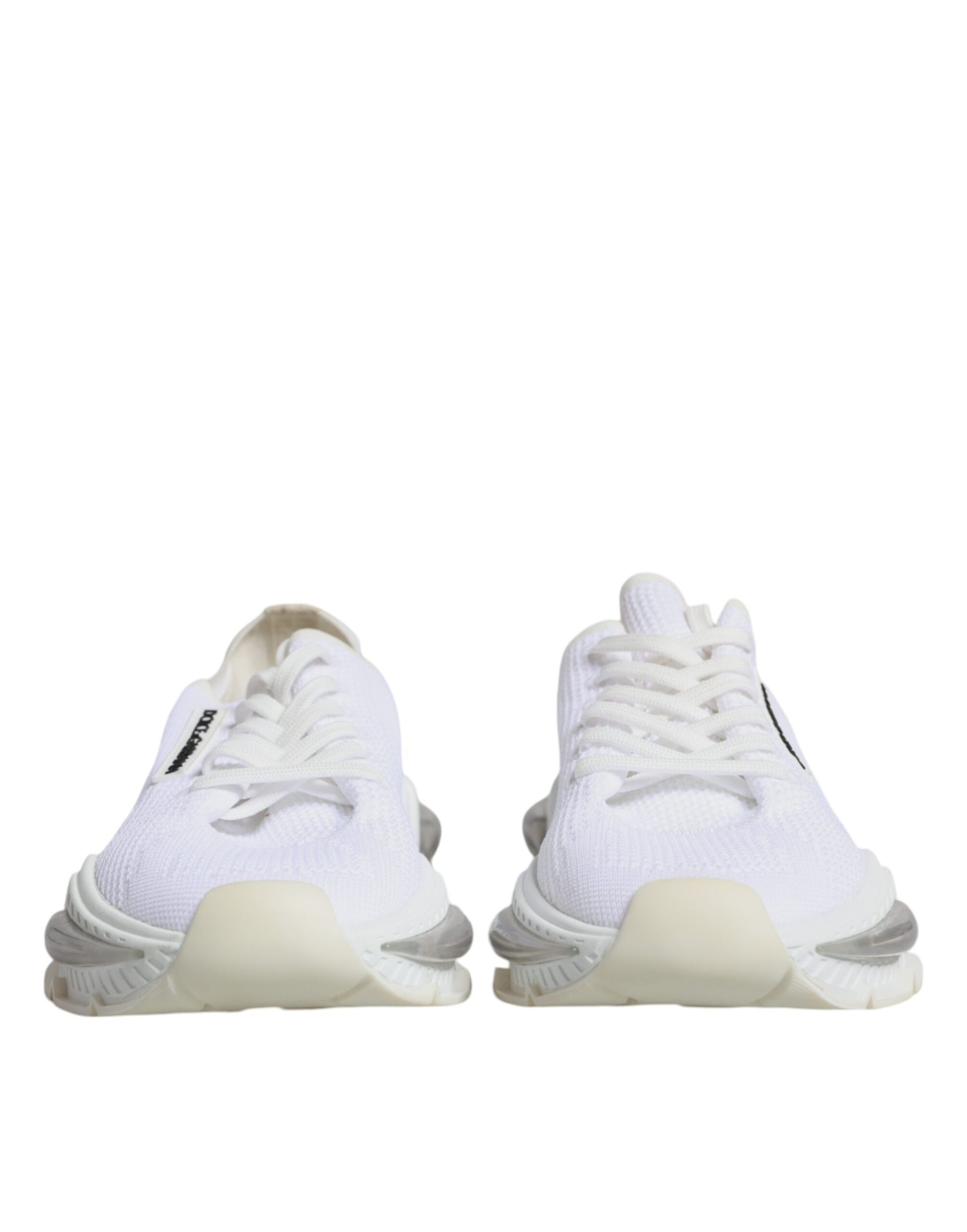 Pair of white sneakers with black laces and logo on side