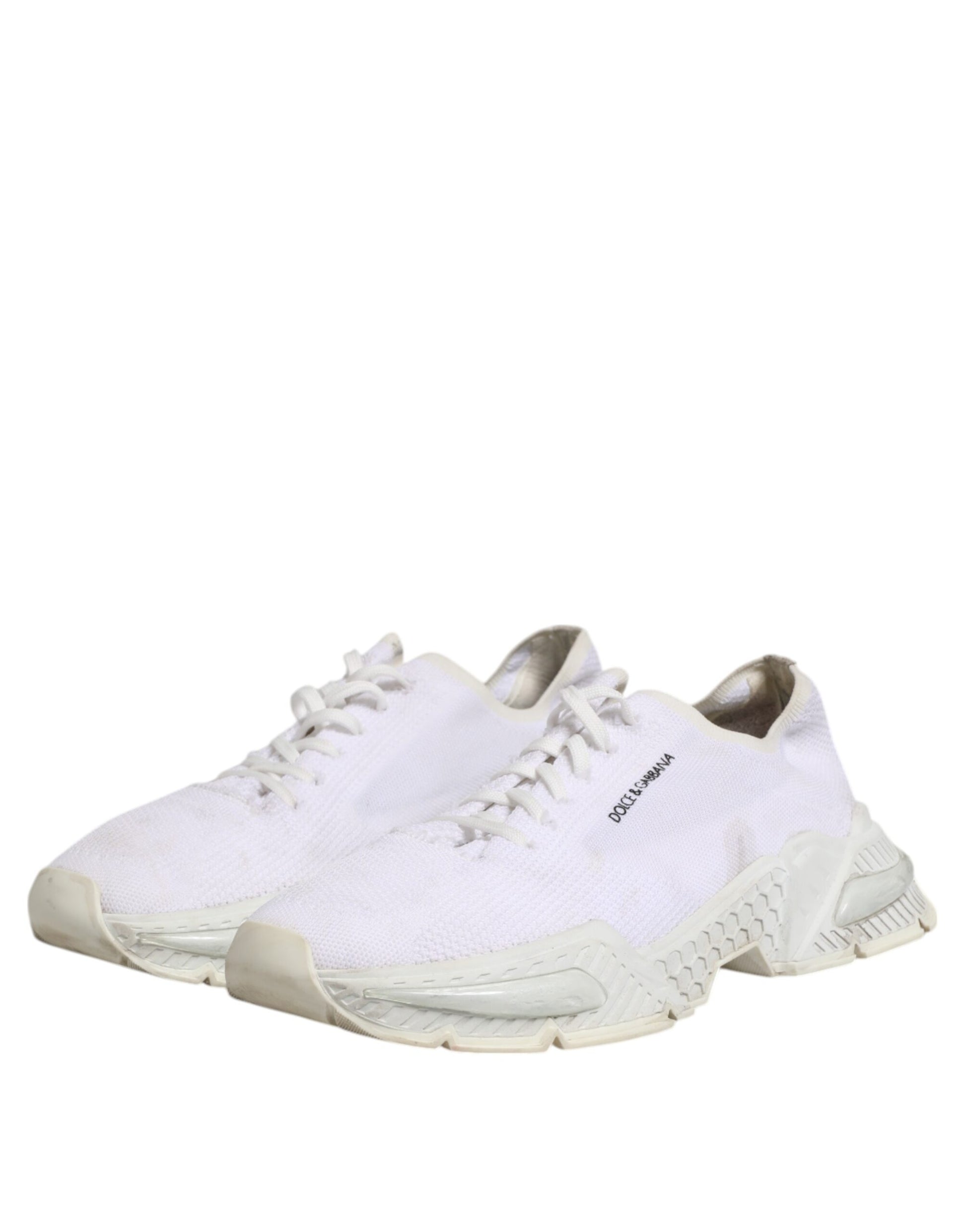 Pair of white sneakers with laces, branded logo on side and back, low top design