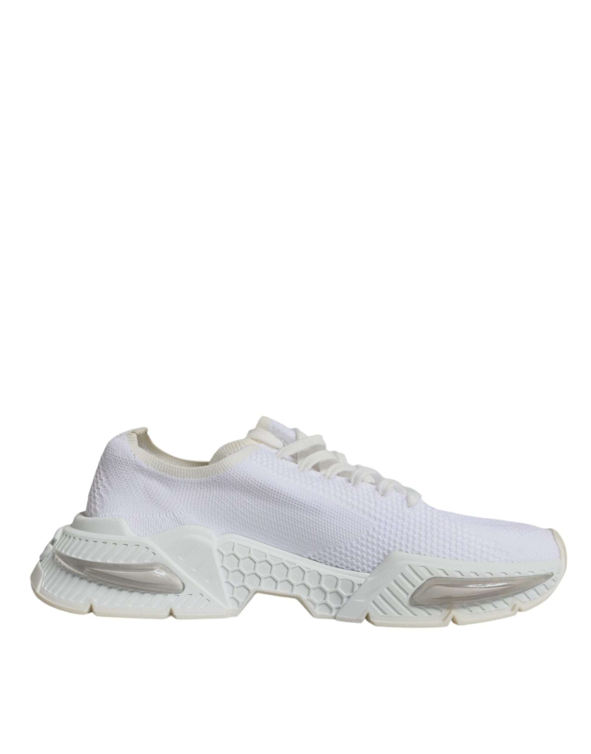 Pair of white sneakers with laces, featuring a low top and a patterned design on the side