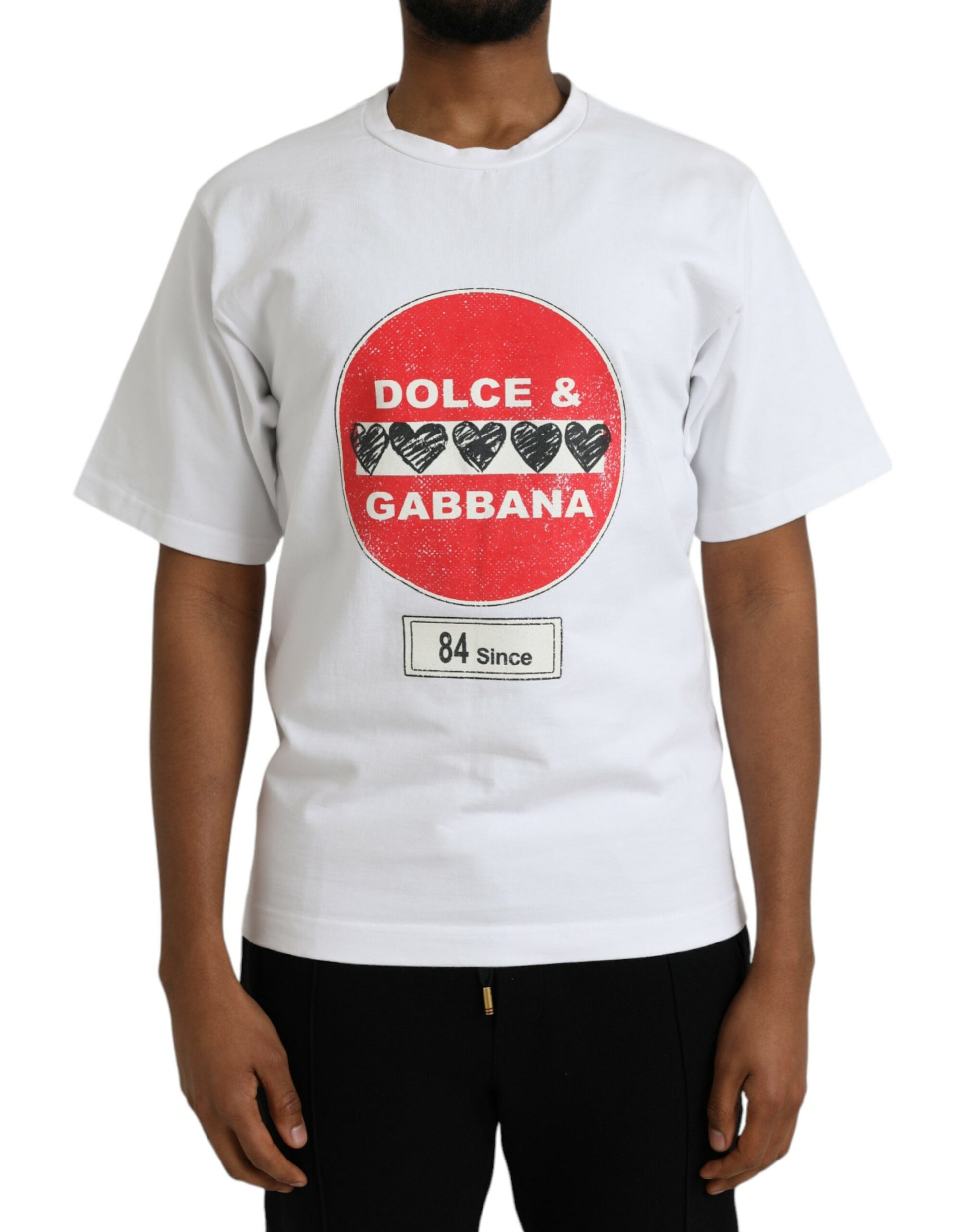 White t-shirt with red circle featuring black text reading "Dolce & Gabbana" and "Gucci"