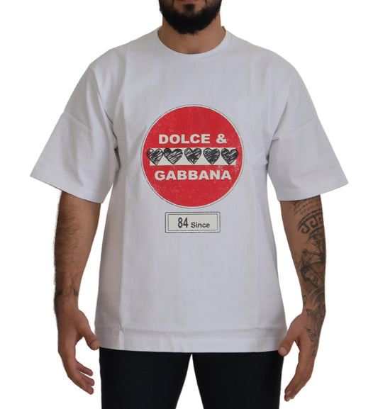 White t-shirt with red circle featuring logos of Dolce & Gabbana
