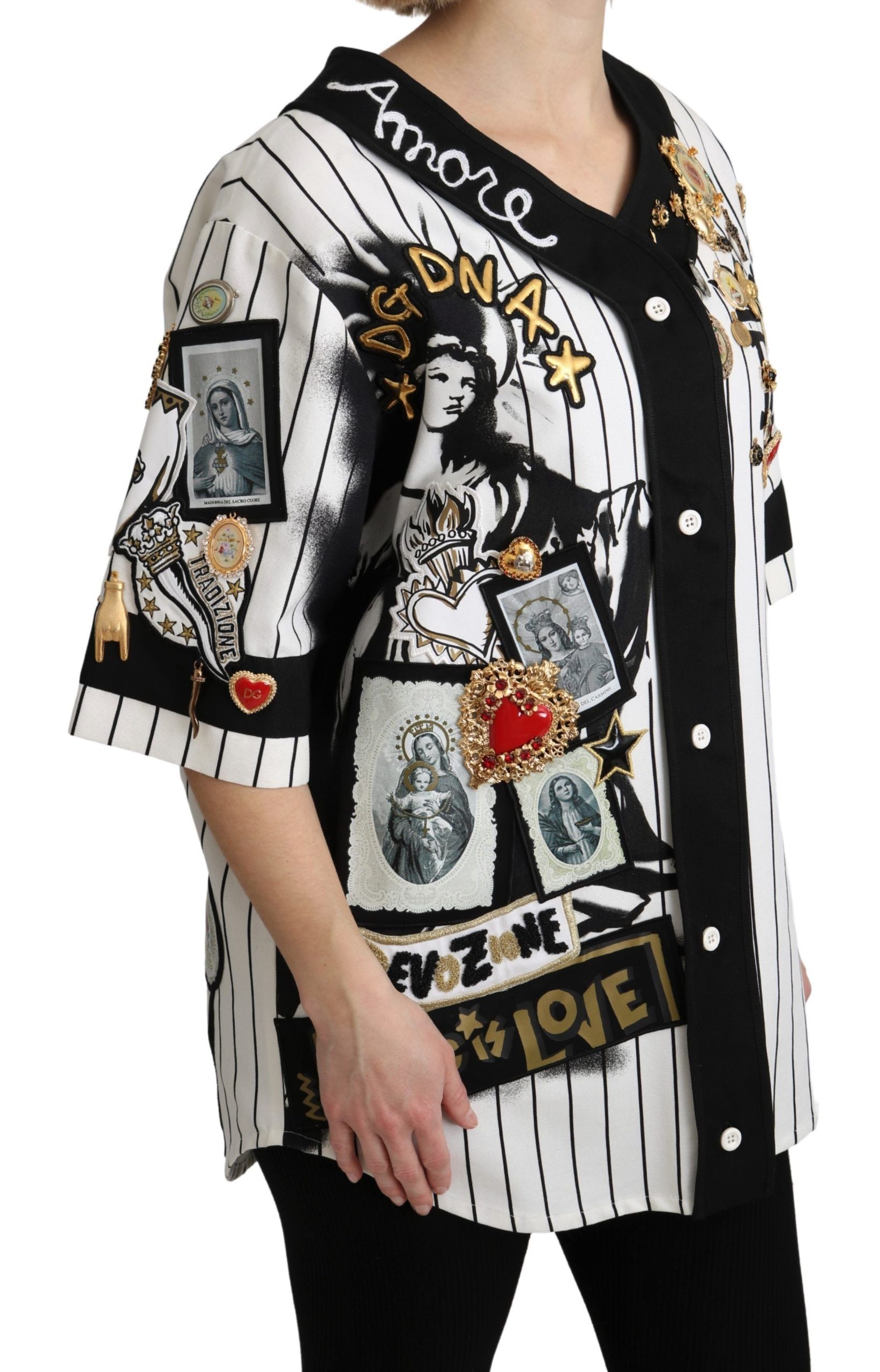 The jacket is black and white with various embellishments including images and text