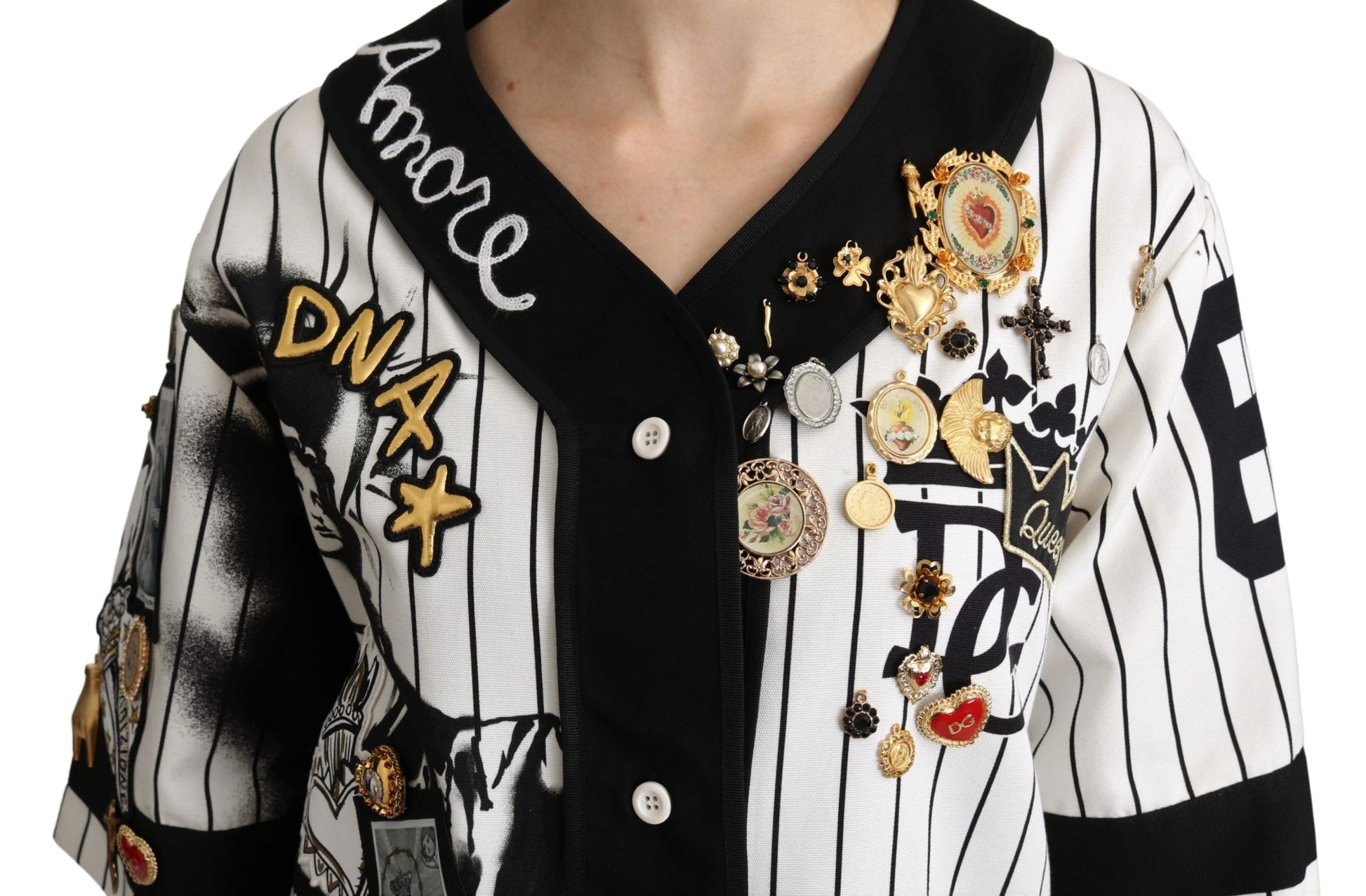 Black and white striped sweater with buttons and pins