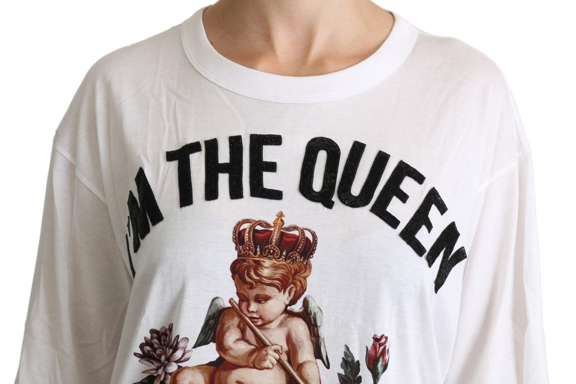 White long sleeve shirt with "I'm the queen" written across chest. Angel design on front
