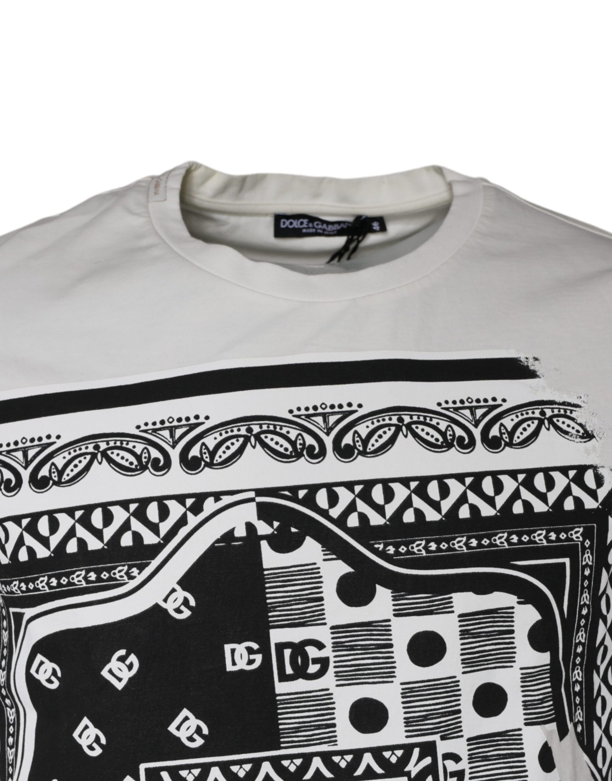 White t-shirt with black tribal pattern on front