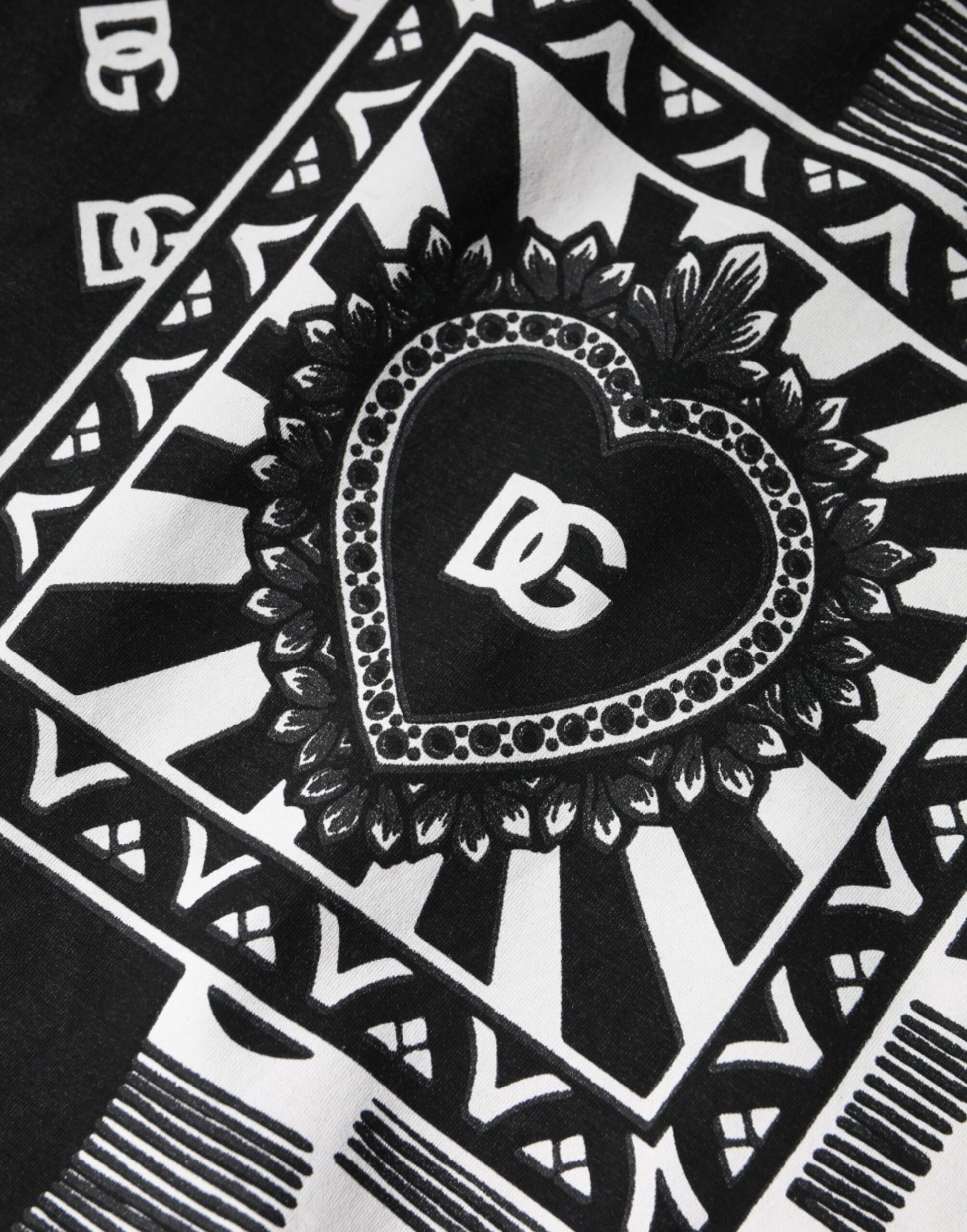 Black and white heart embroidery on fabric