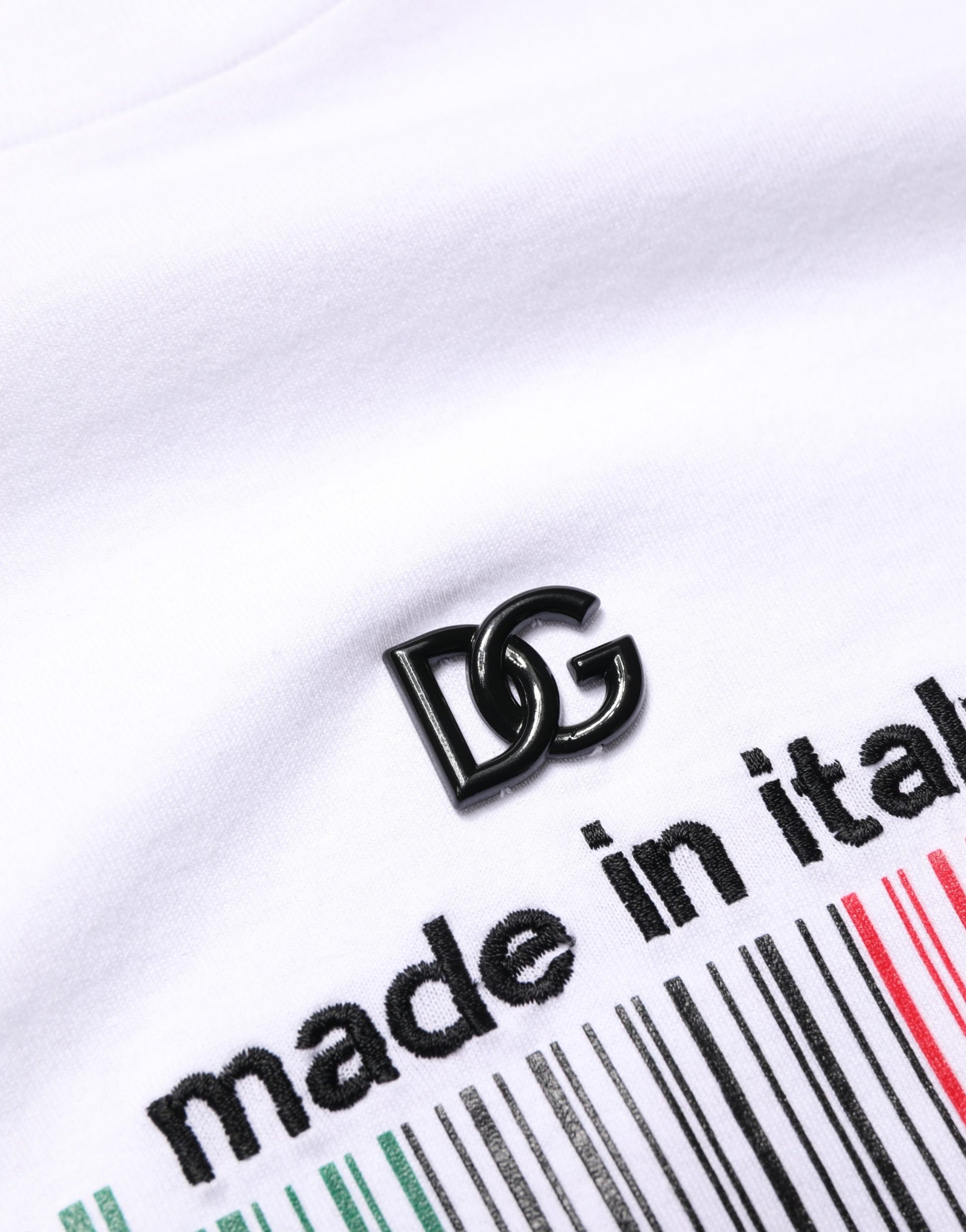White t-shirt with DC logo on left chest and "Made in Italy" printed barcode on right sleeve
