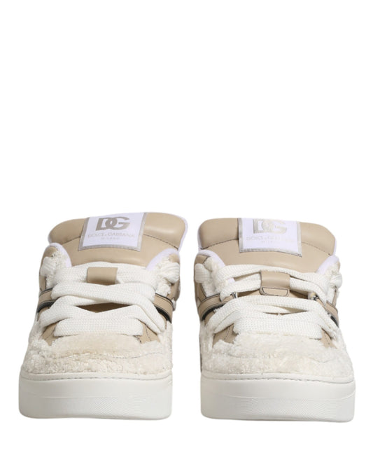Pair of white beige faux shearling low top sneakers with black laces
