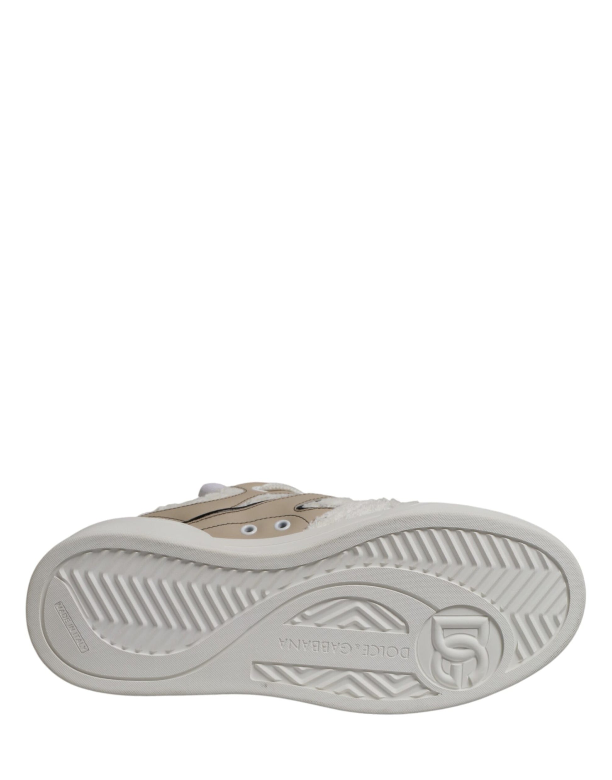 A single white beige faux shearling shoe with a low top and a visible logo on the side