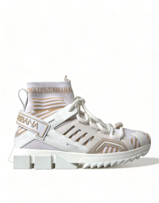 Pair of white sneakers with tan and black accents