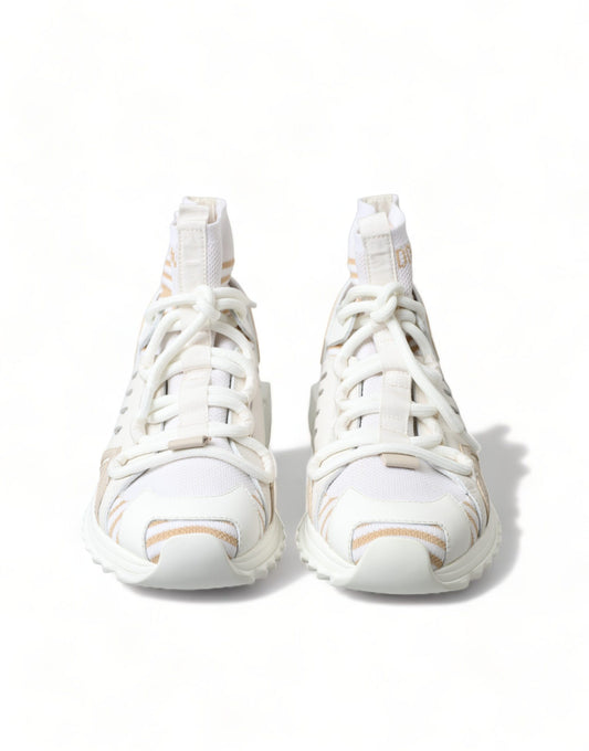 Pair of white sneakers with laces tied in a bow