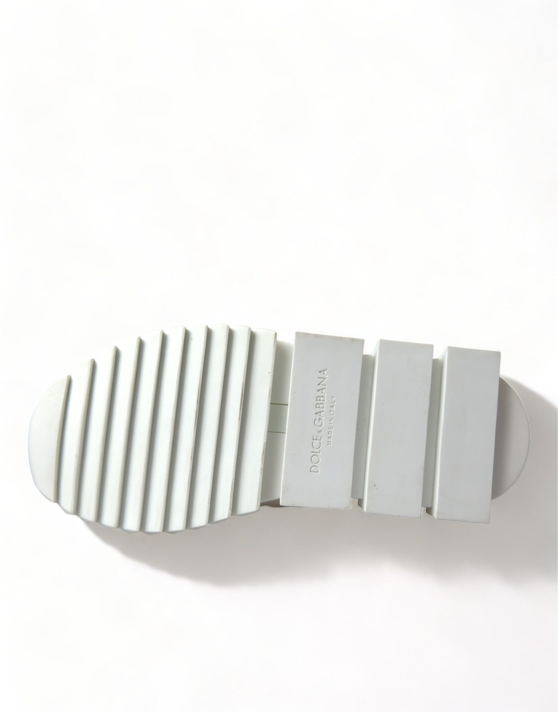 Footwear with a sole design that resembles a staircase
