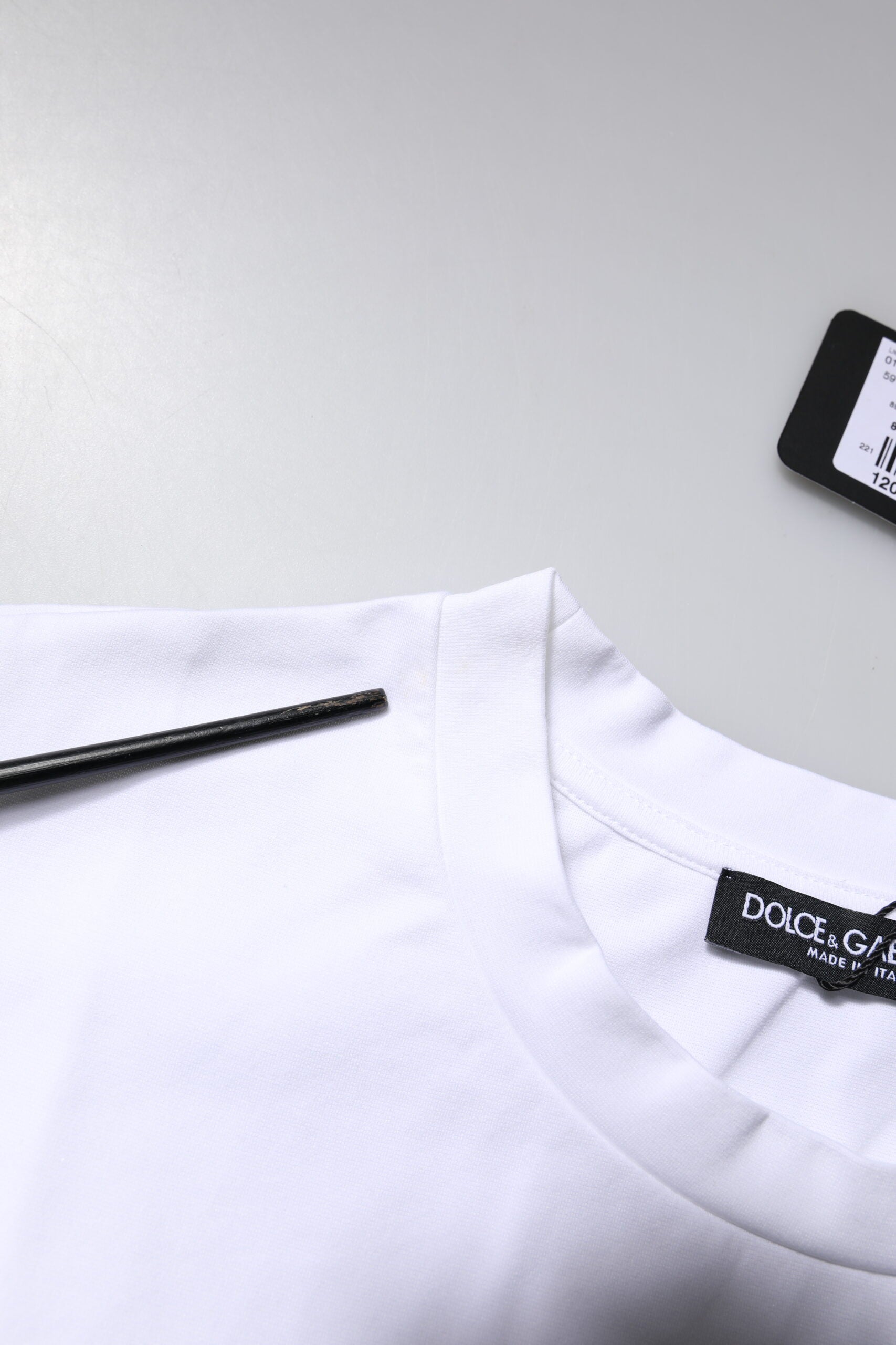 White t-shirt on hanger