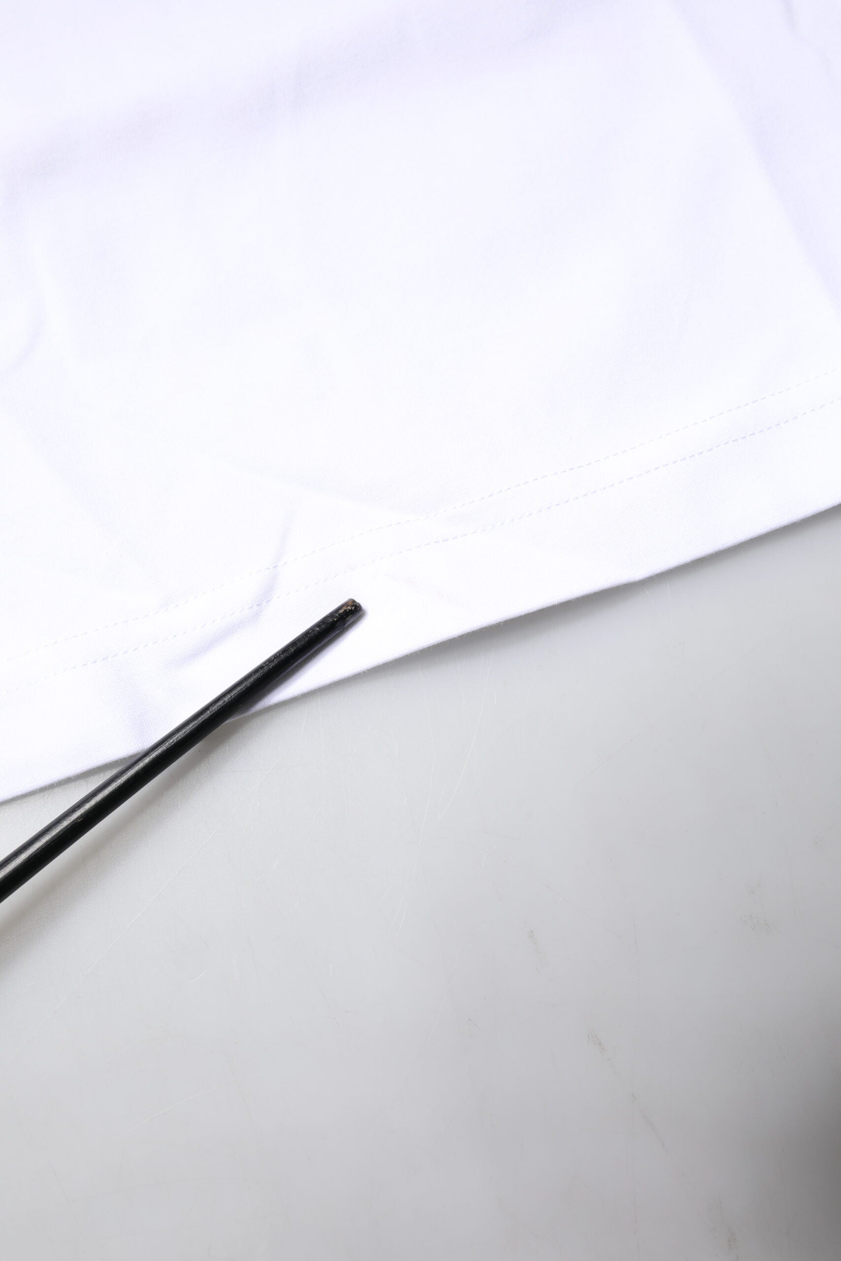 White t-shirt on table