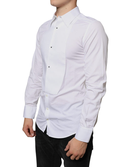 A white formal dress shirt with a bib collar and black buttons