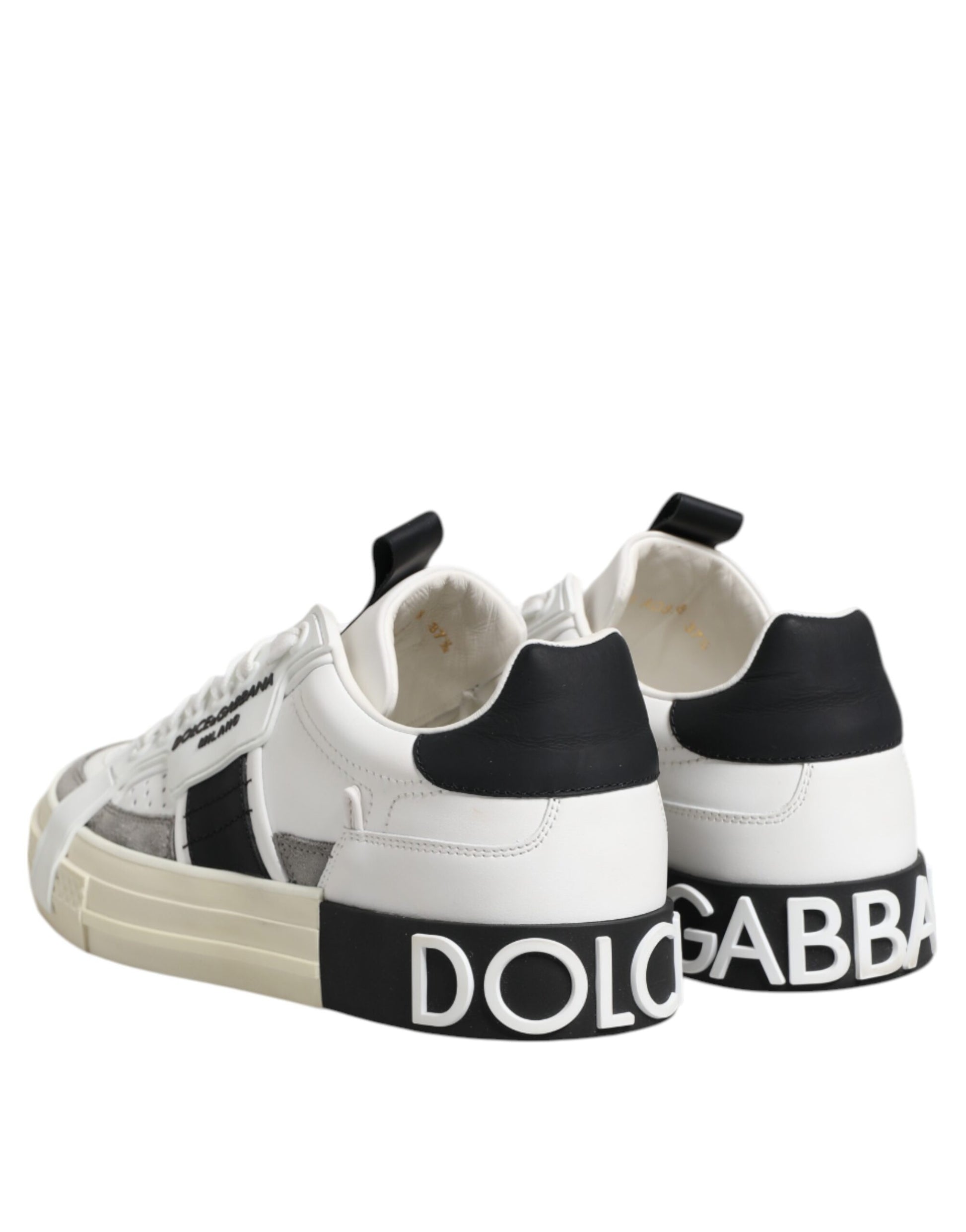 Pair of sneakers with brand name on side