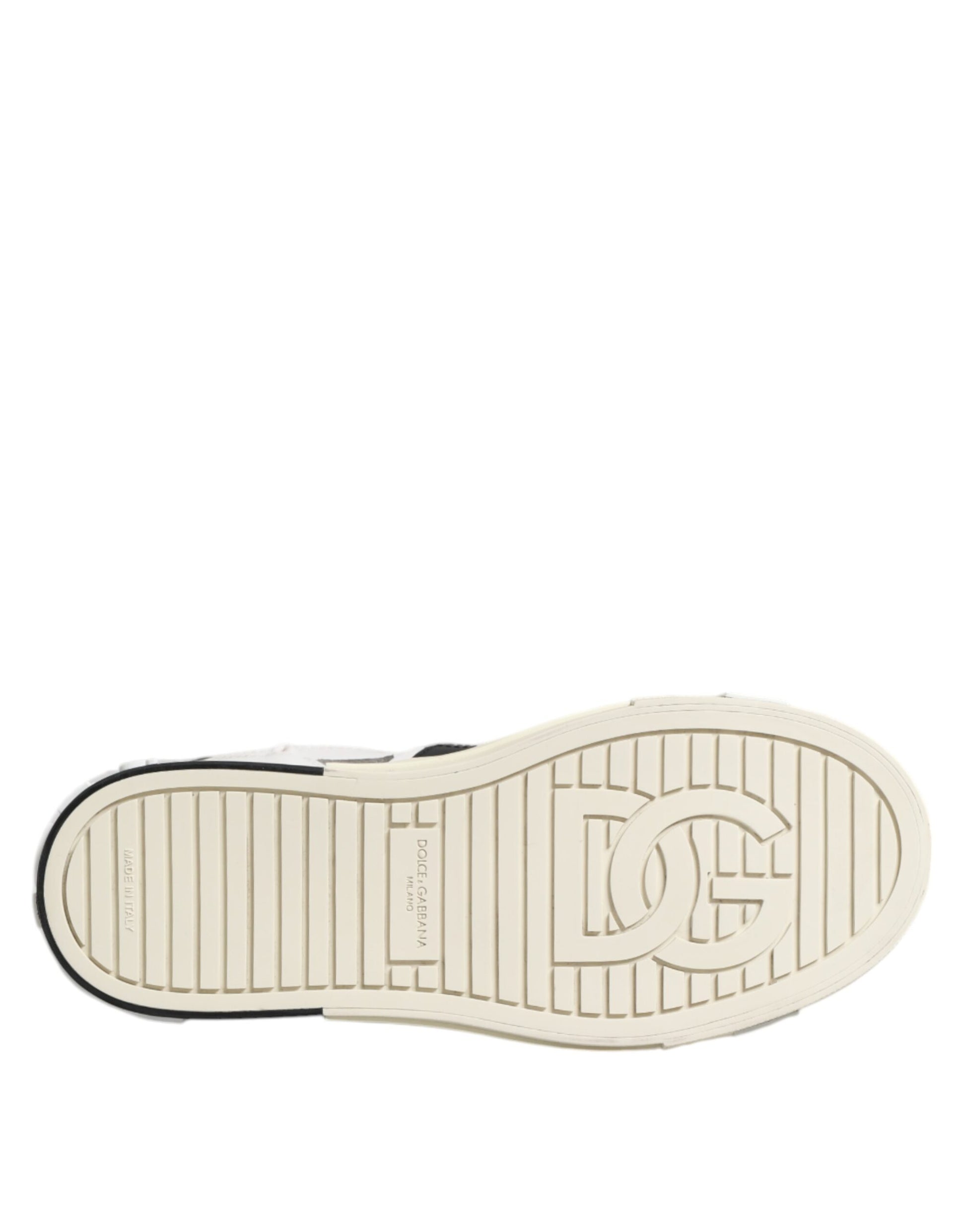 Tan shoe with black logo on sole