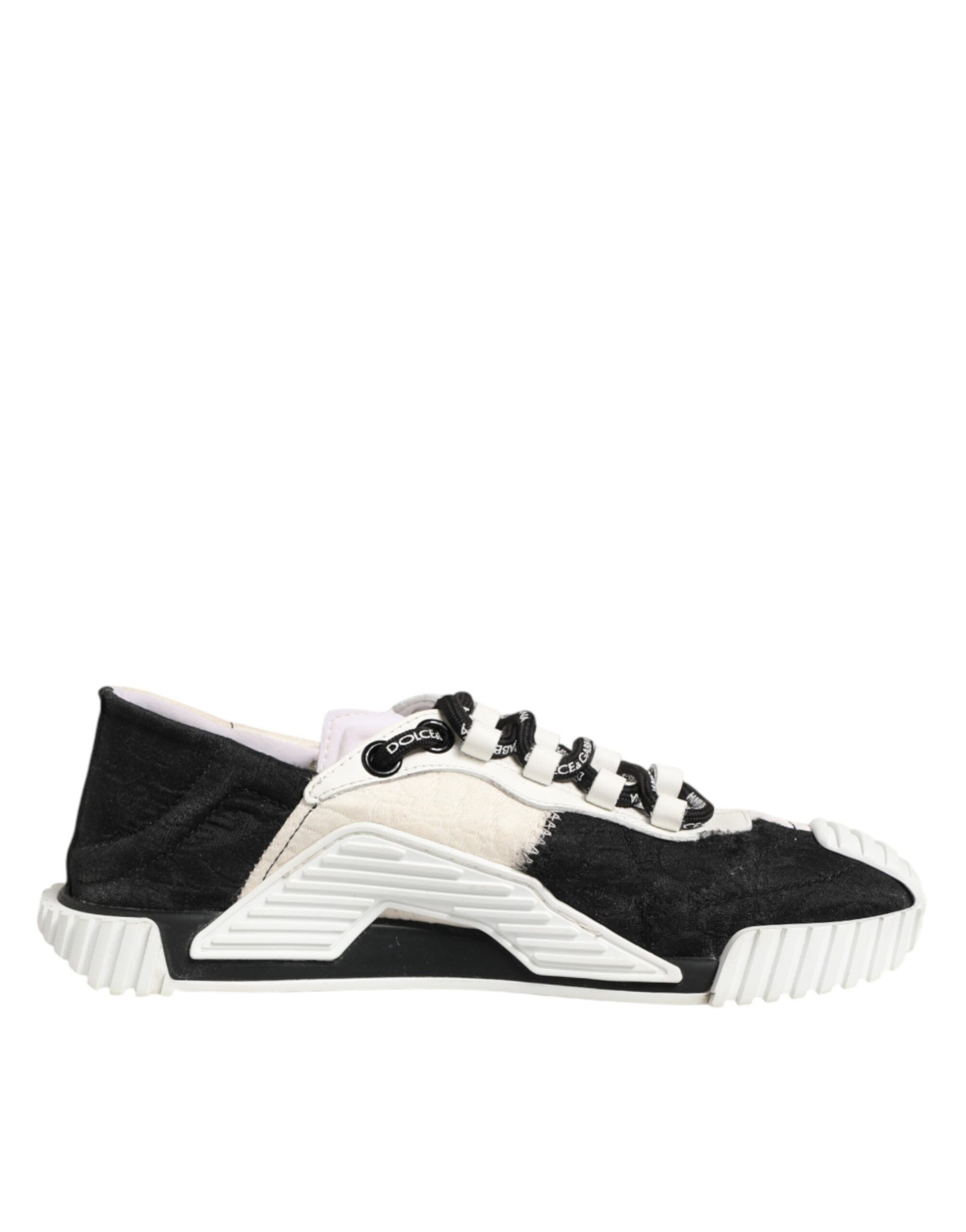 A black and white leather sneaker with a lace-up front, featuring the brand name on the side