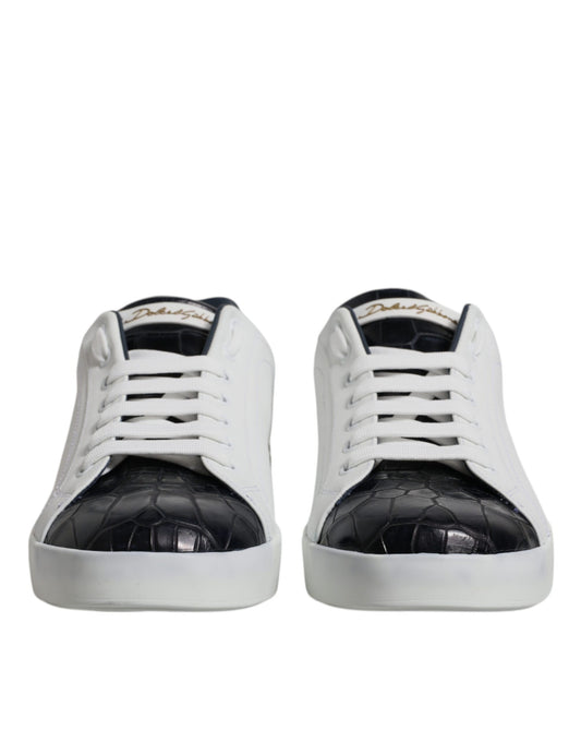 Pair of white black leather sneakers with gold accents