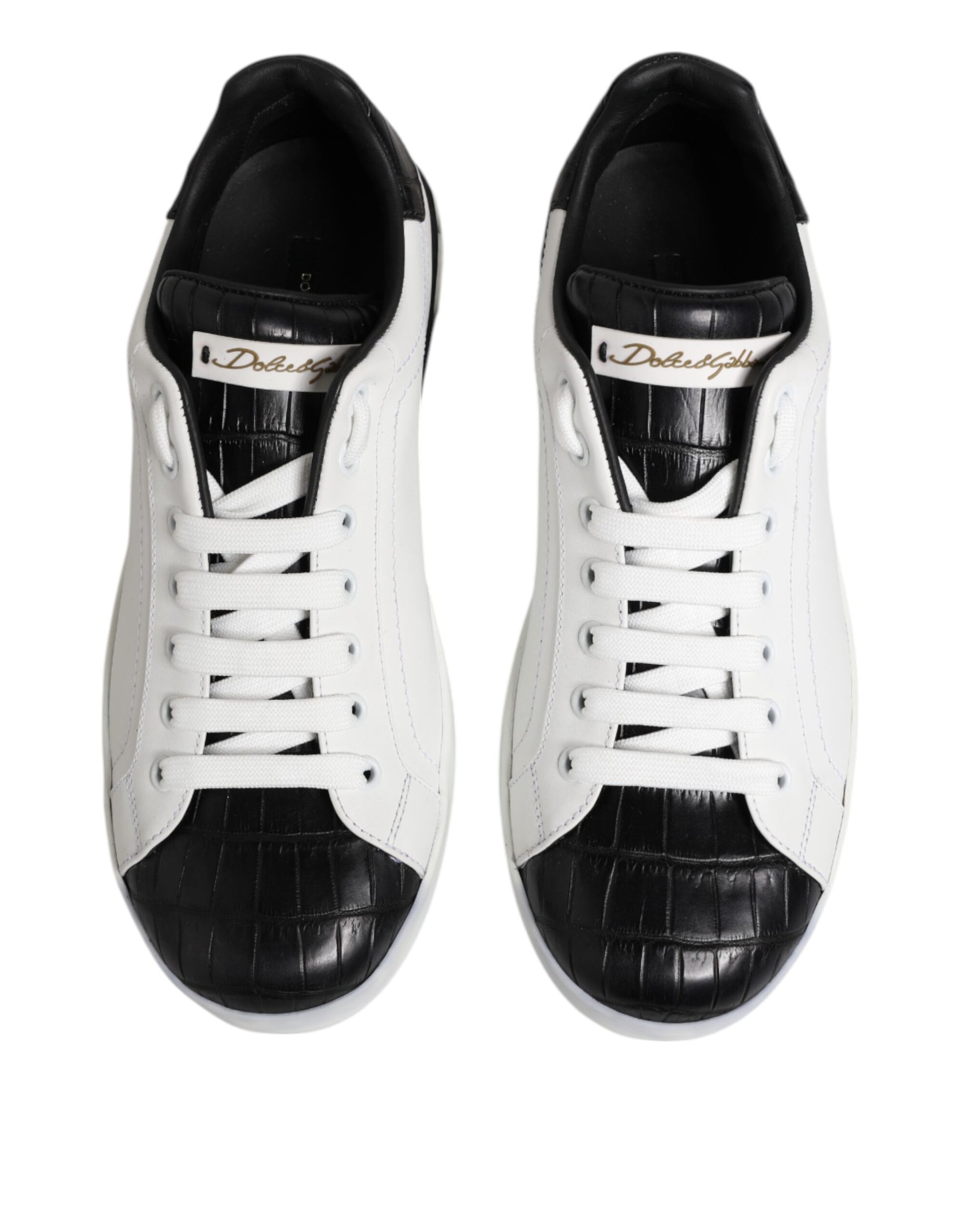 Pair of white black leather sneakers with gold accents, branded Dolce & Gabbana