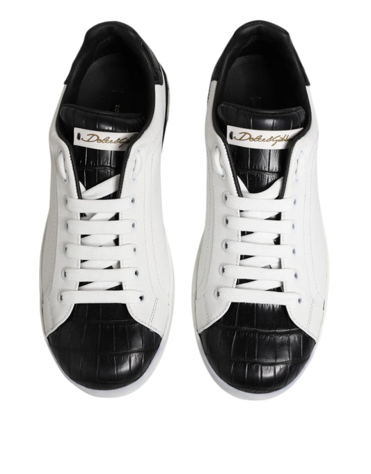 Pair of white black leather sneakers with gold accents, branded Dolce & Gabbana