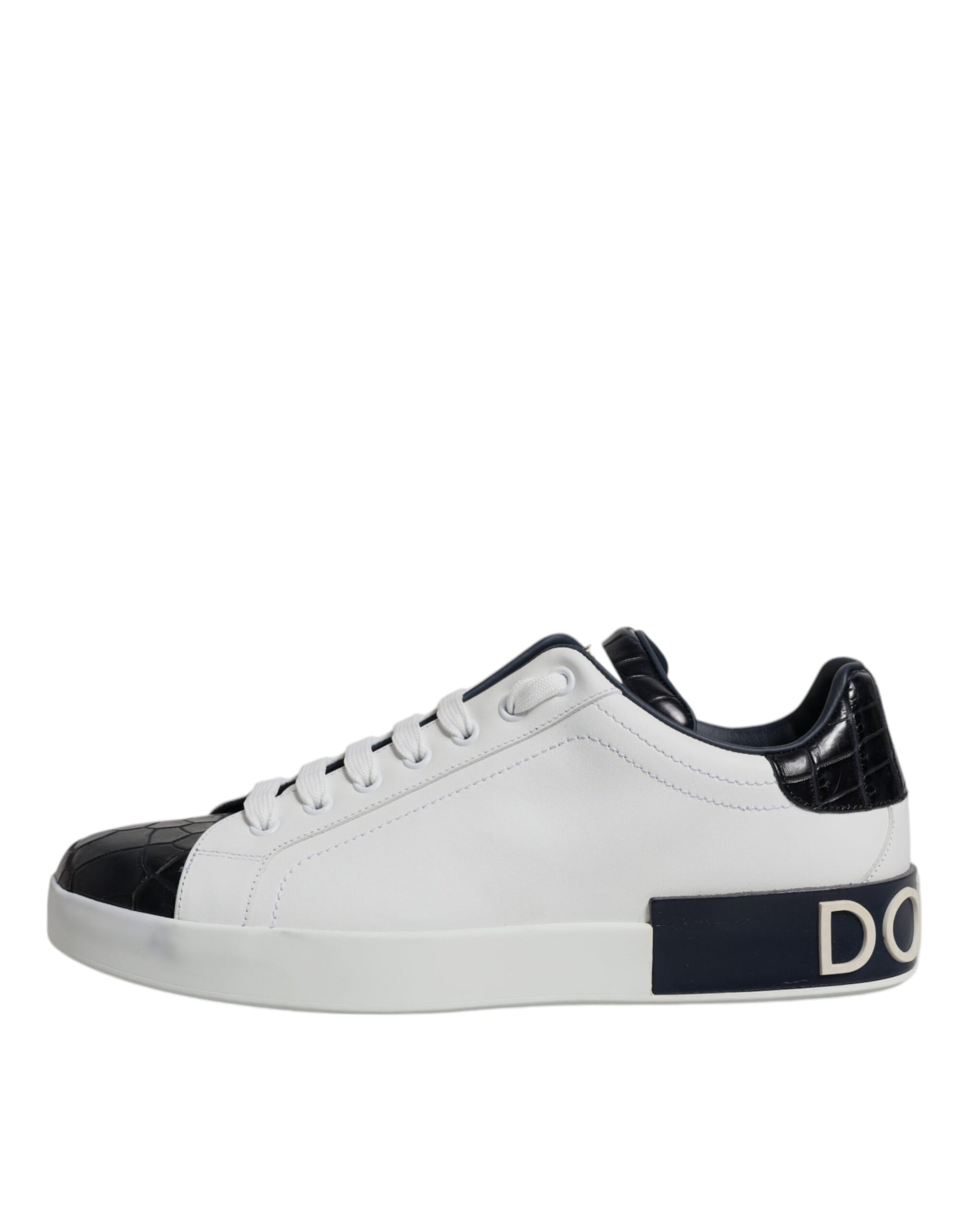 A pair of white black leather sneakers with a brand logo on the side
