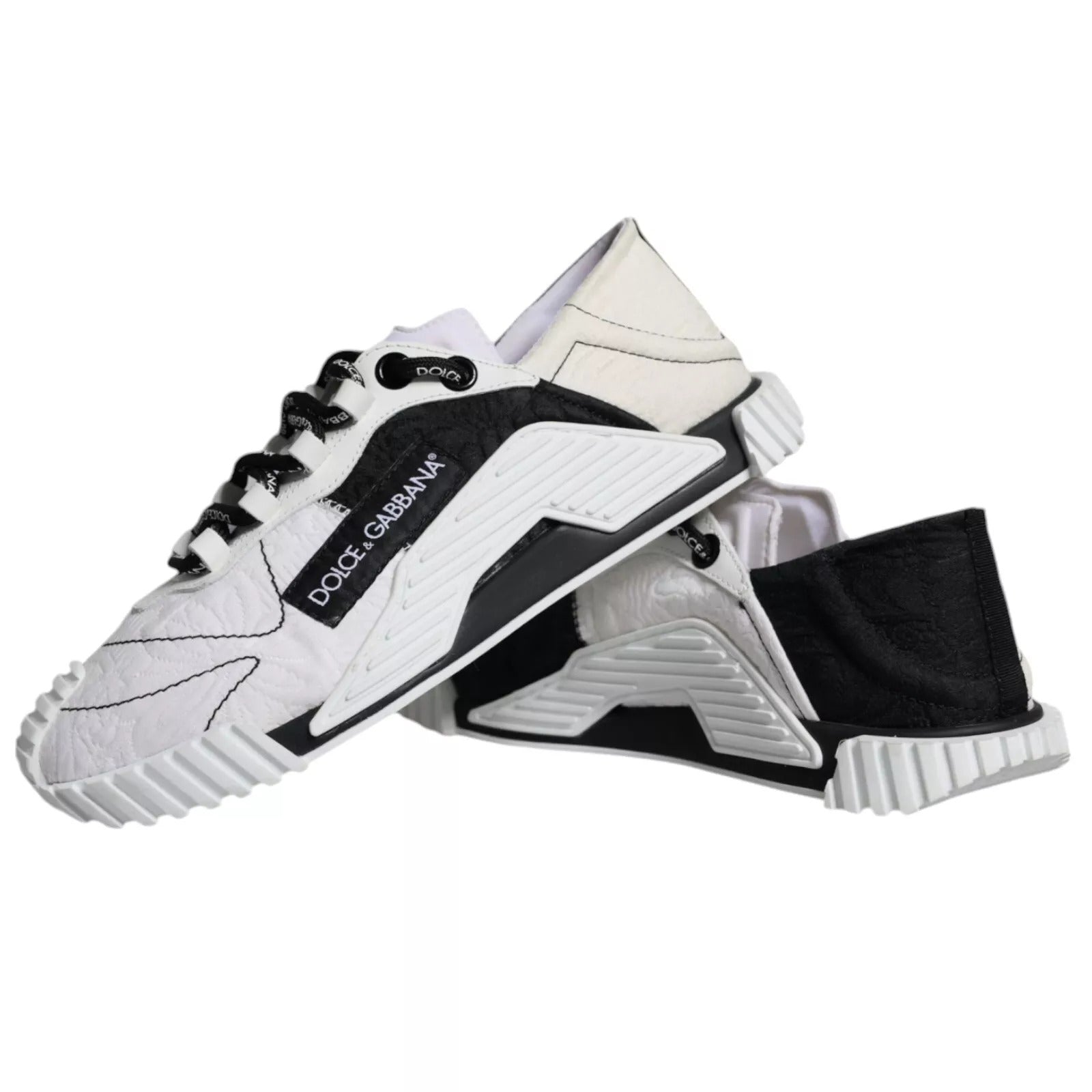 Pair of children's sneakers in black and white colors
