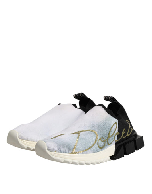 White black low top sneakers with gold lettering on side