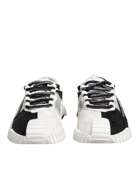 Pair of black and white sneakers with laces