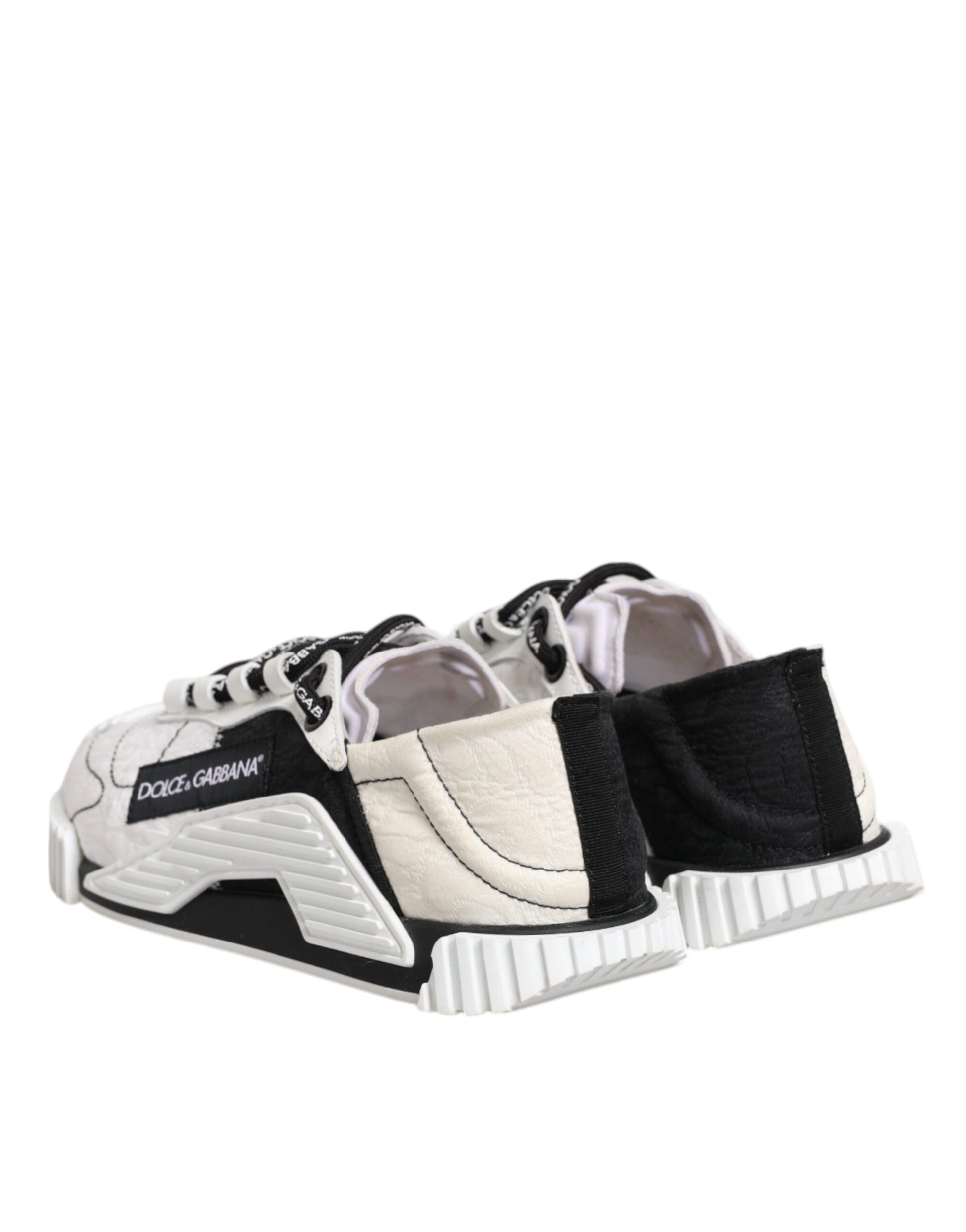 Pair of sneakers with black straps and white soles