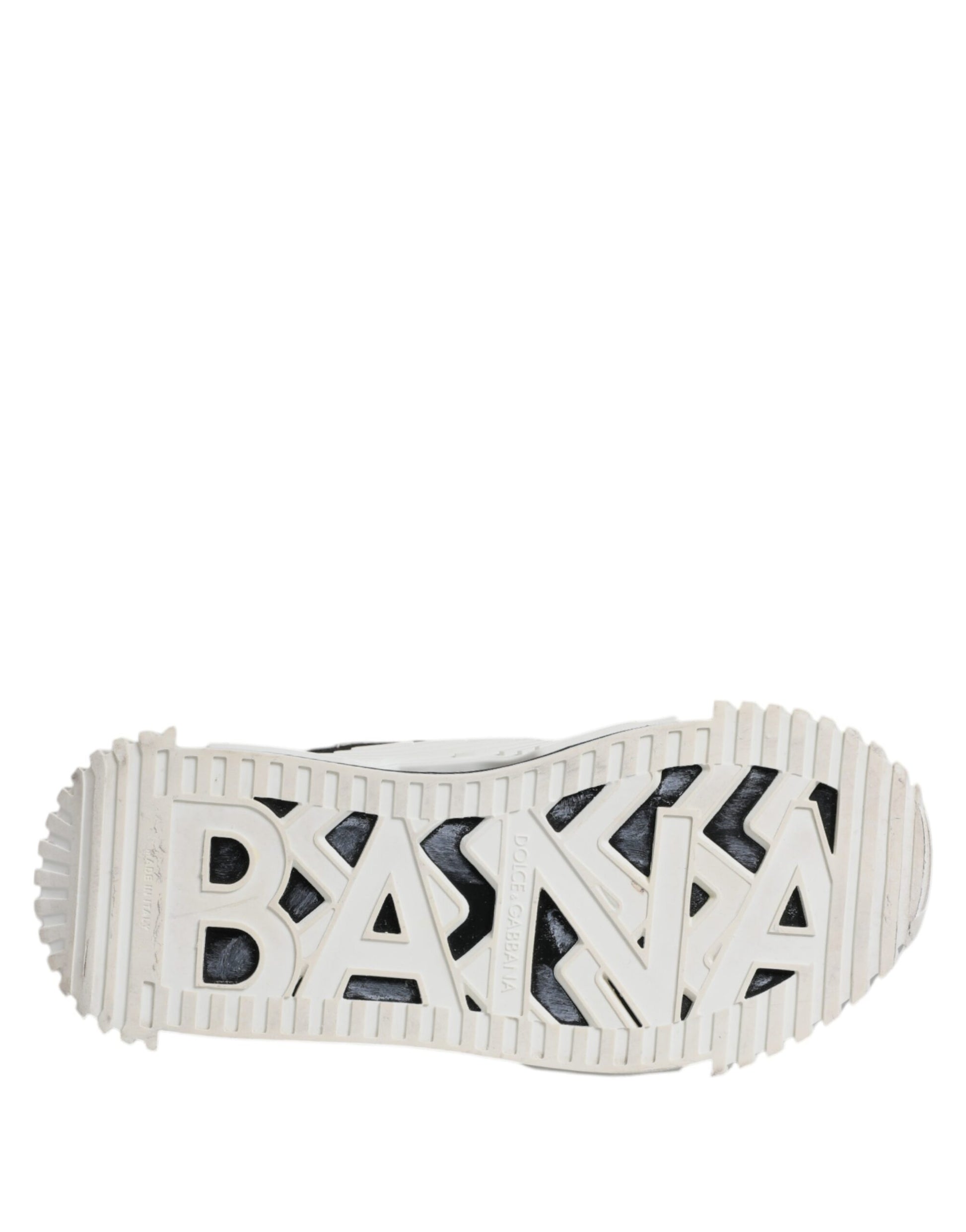 White shoe with black sole