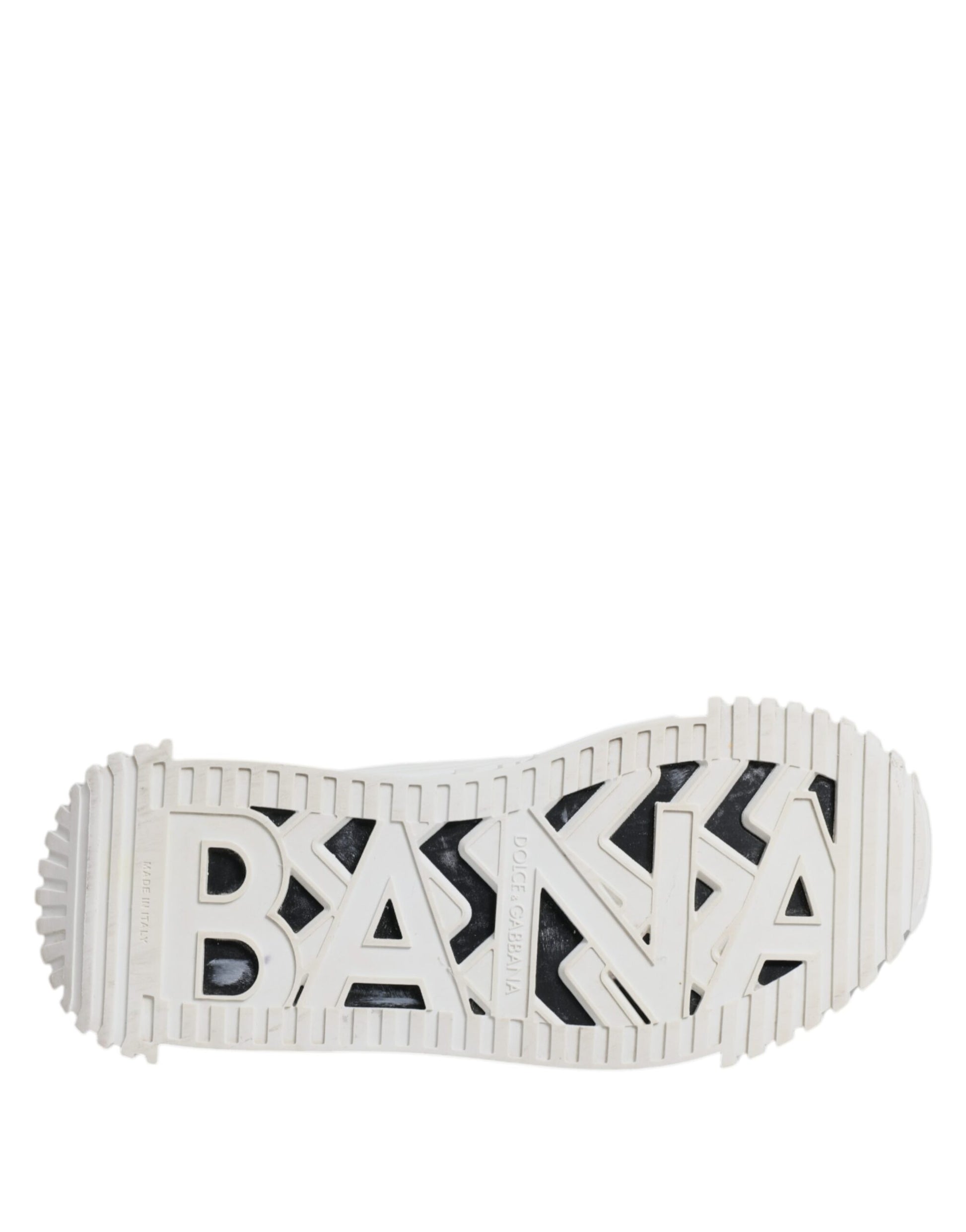 White sneaker with black sole