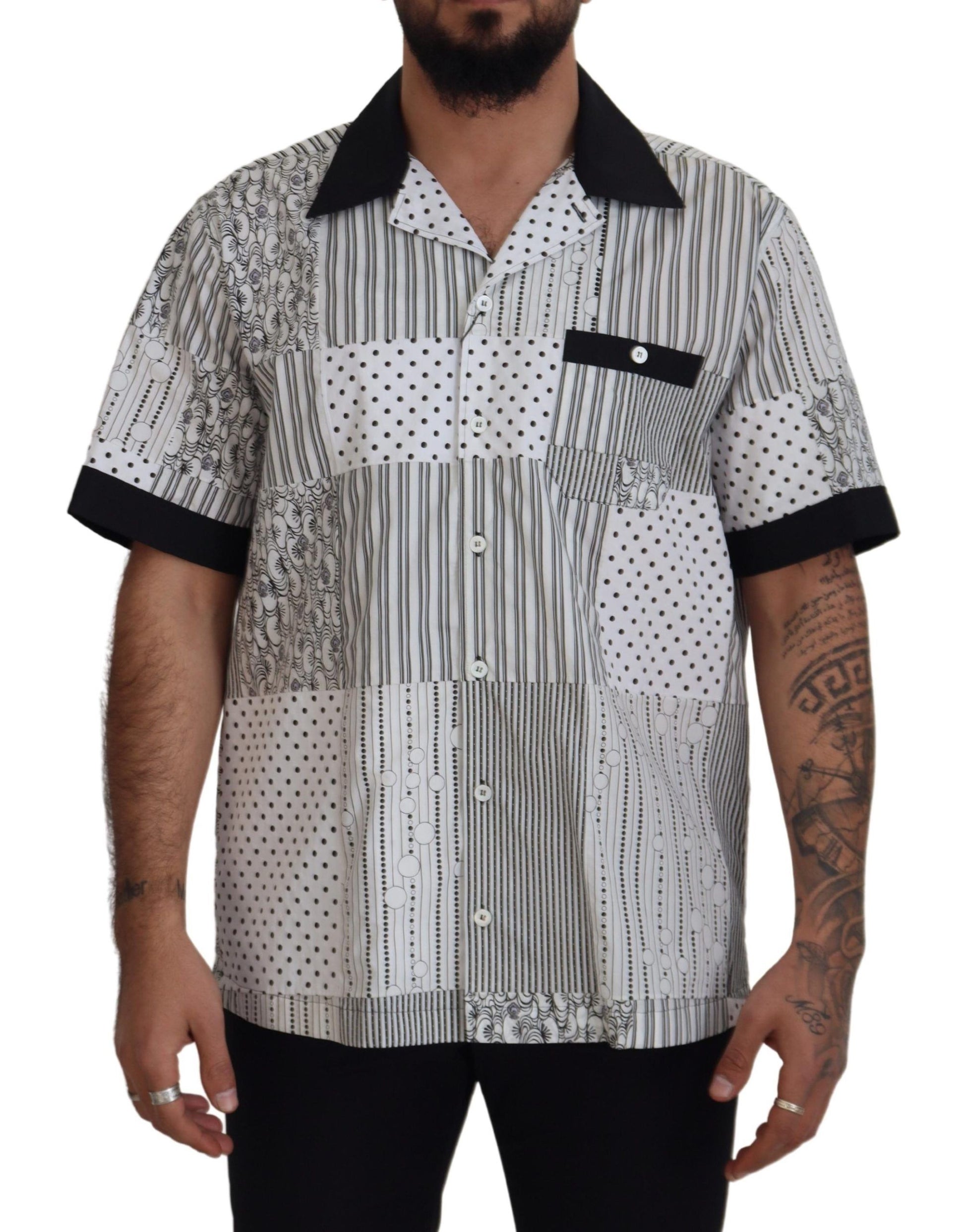 Man wearing a patterned shirt with black collar and pocket details