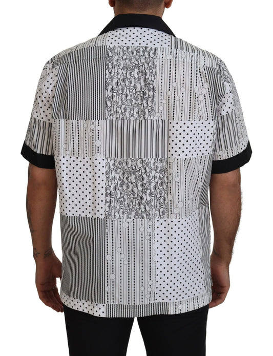 Man wearing a black and white shirt with geometric pattern on back