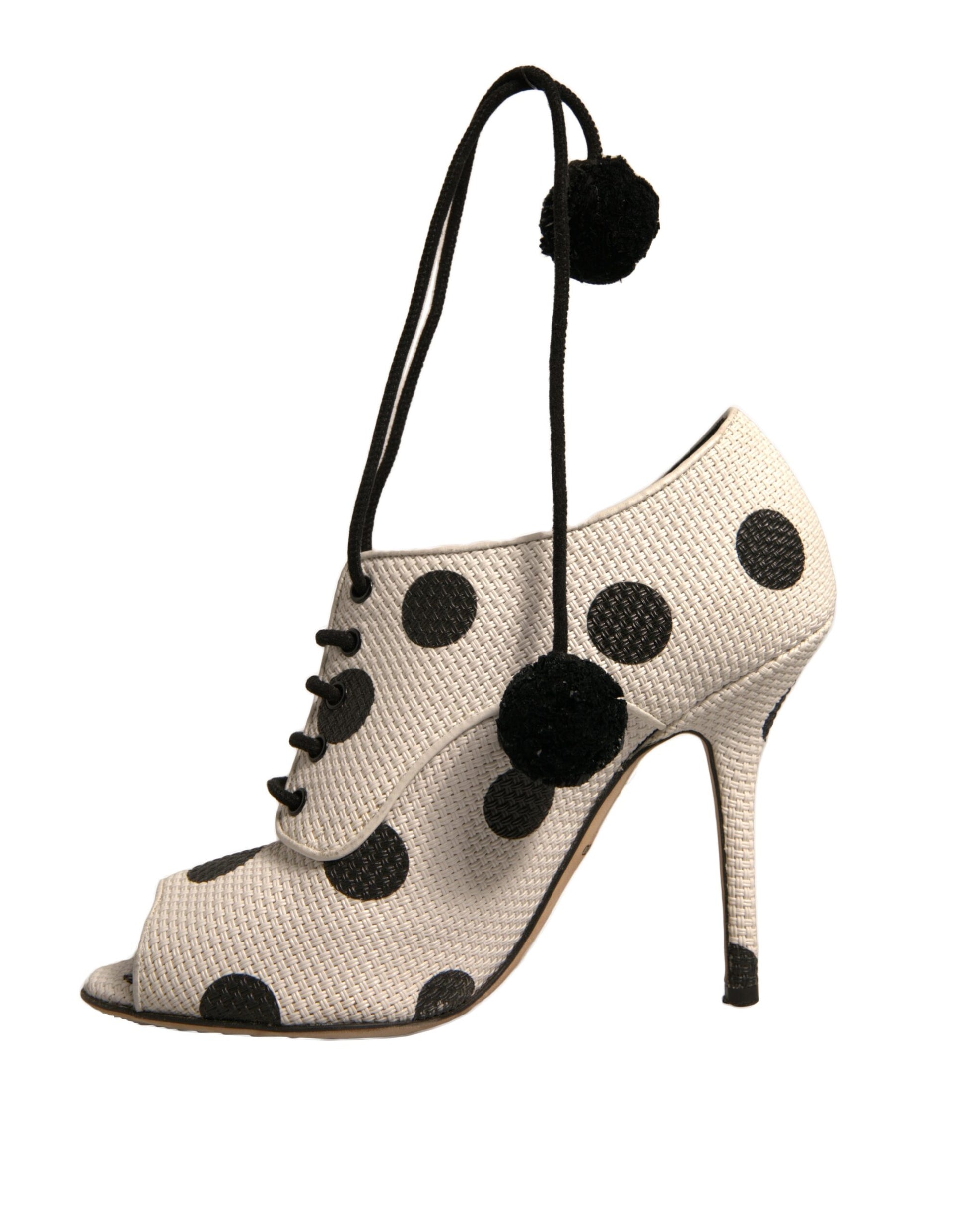 White polka dot heeled shoes with black ties