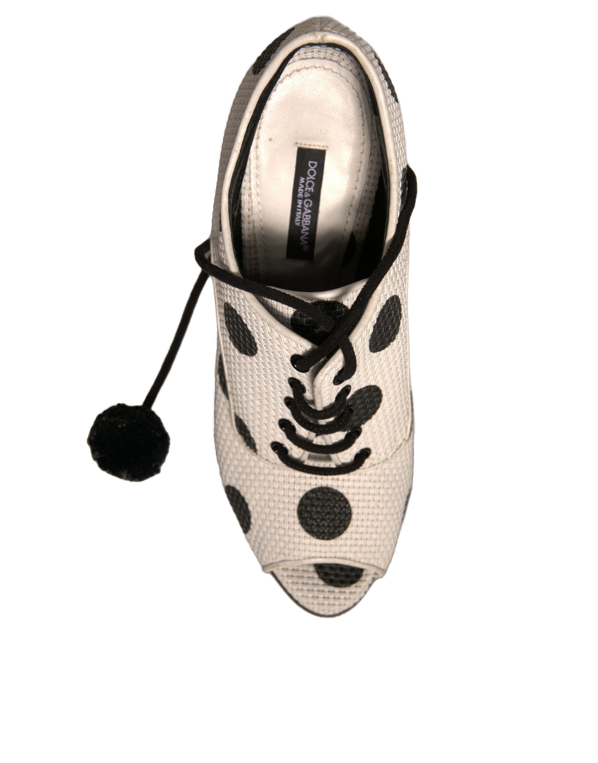 Black and white polka dot shoe with black laces