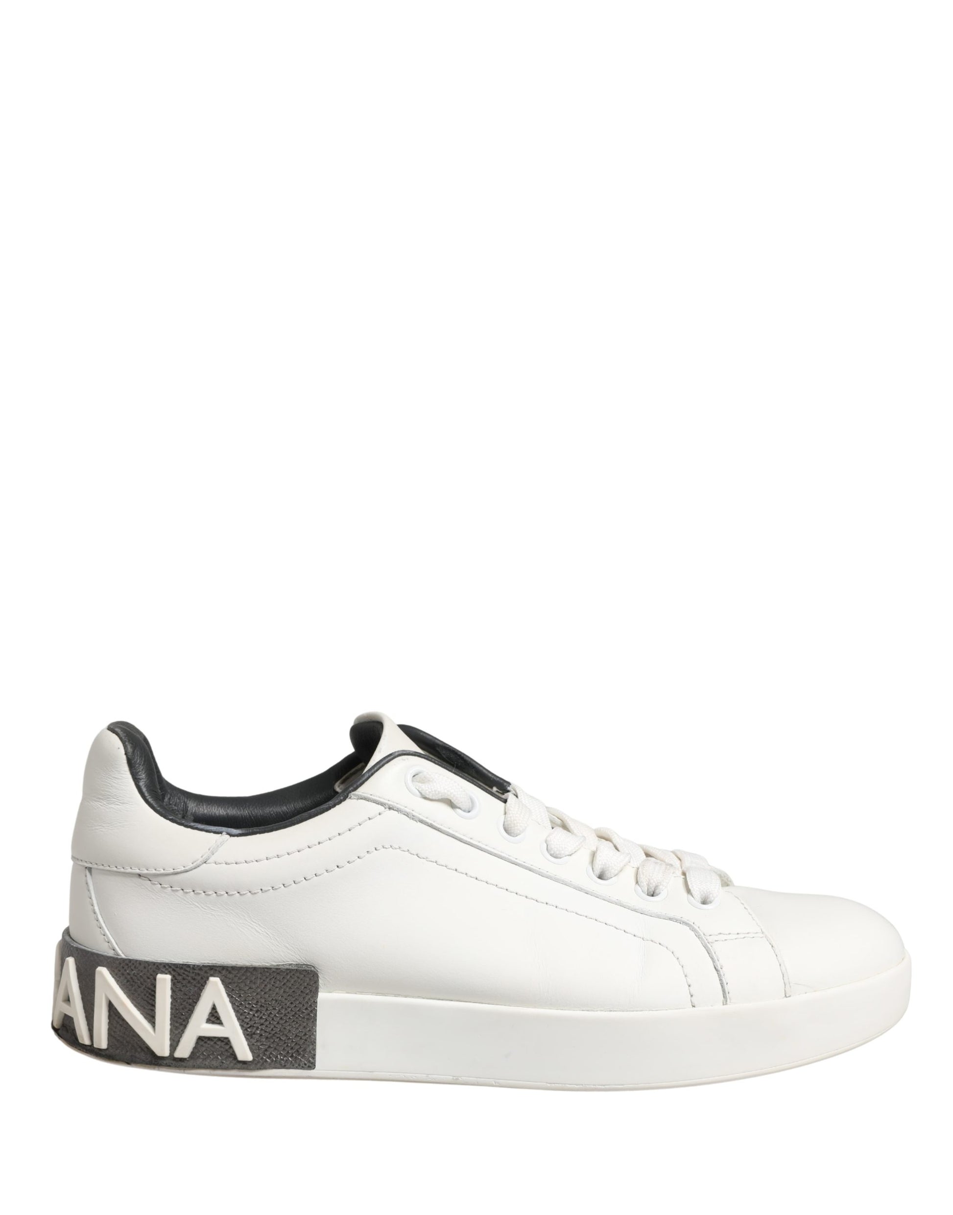 White leather sneakers with black laces, featuring a black logo on the side and a black sole