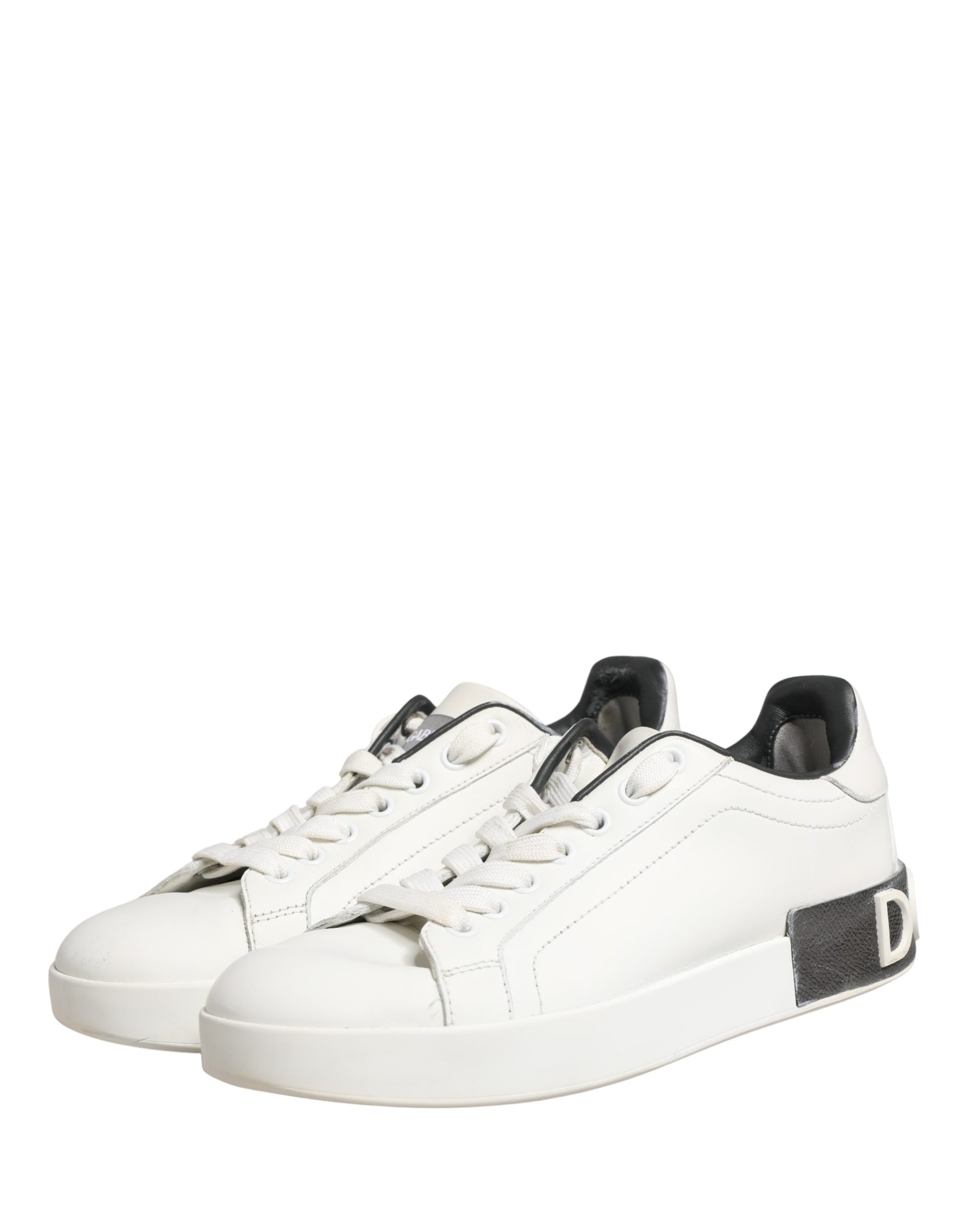 White leather sneakers with black accents, featuring a logo on the side and a lace-up front