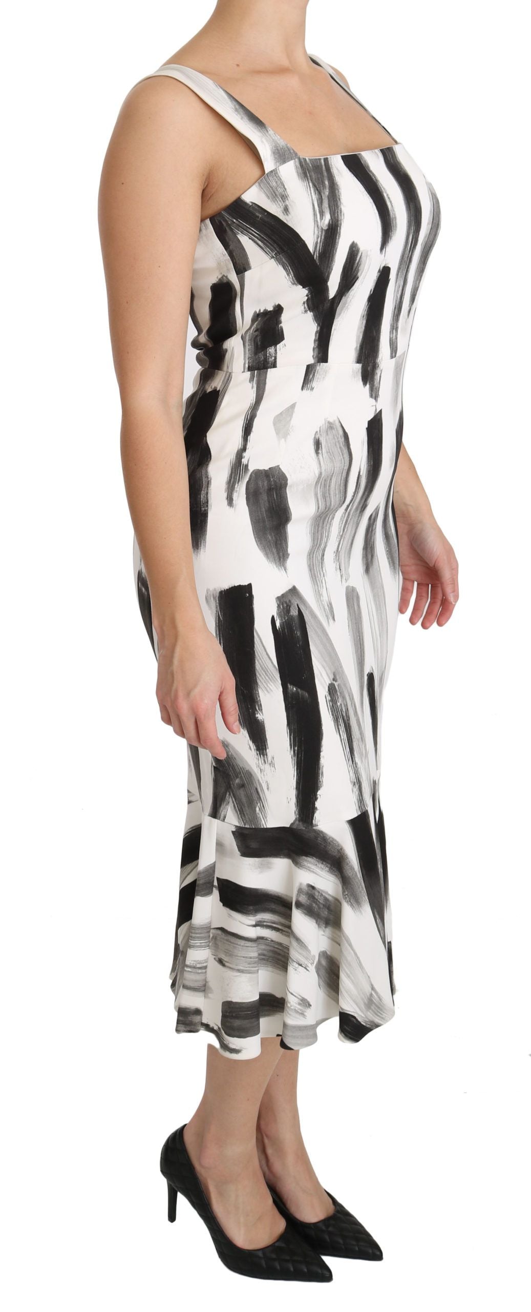 A midi dress with a white black print, made of viscose fabric