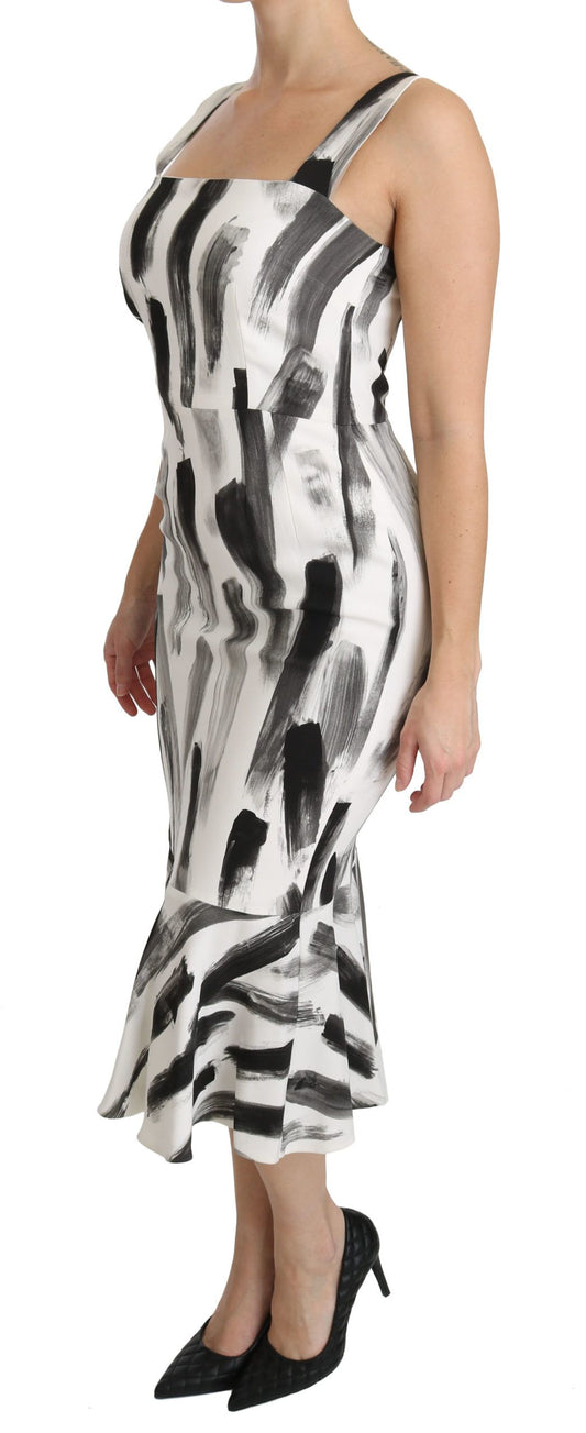 A midi dress with a white, black and grey print on viscose fabric
