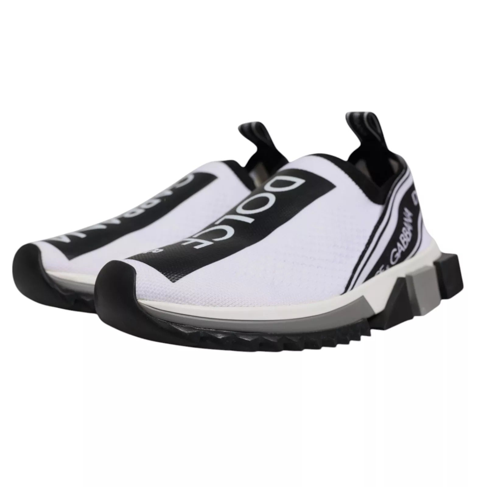 White sneakers with black laces and a black stripe on the side