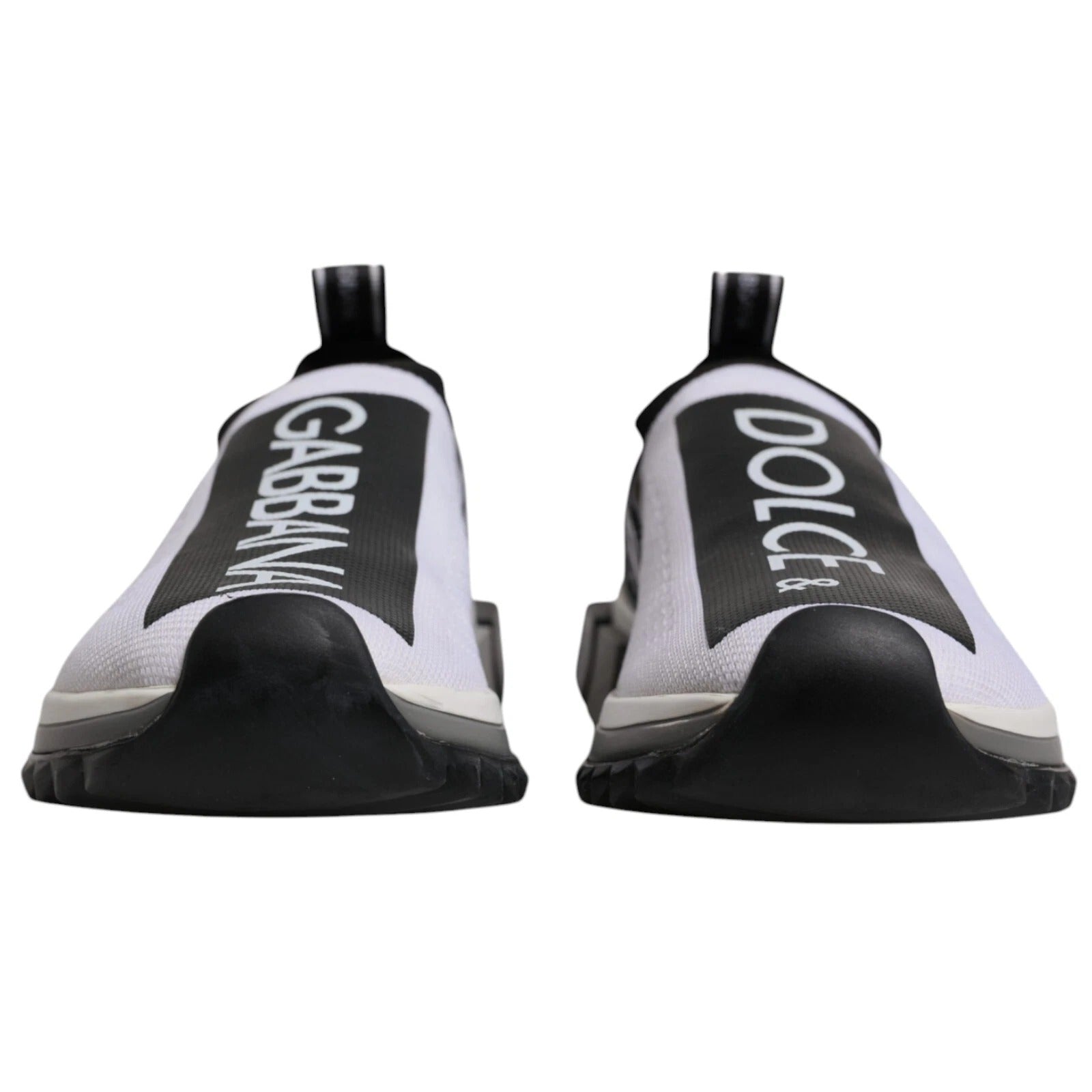 Pair of white sneakers with black accents