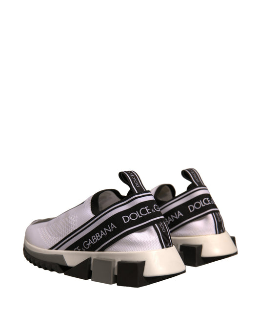 White baby shoes with black straps and white soles