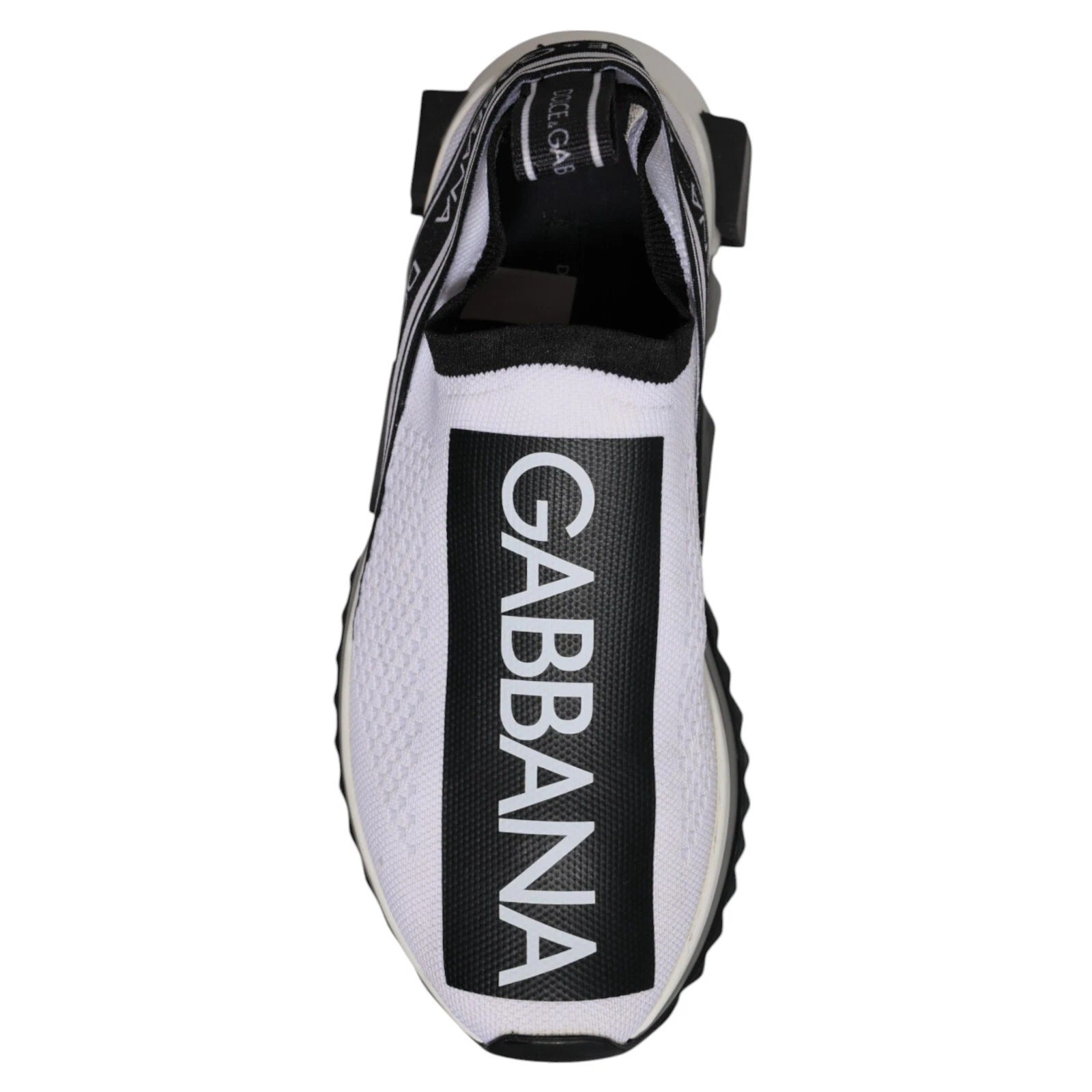 White sneaker with black sole and white logo on side